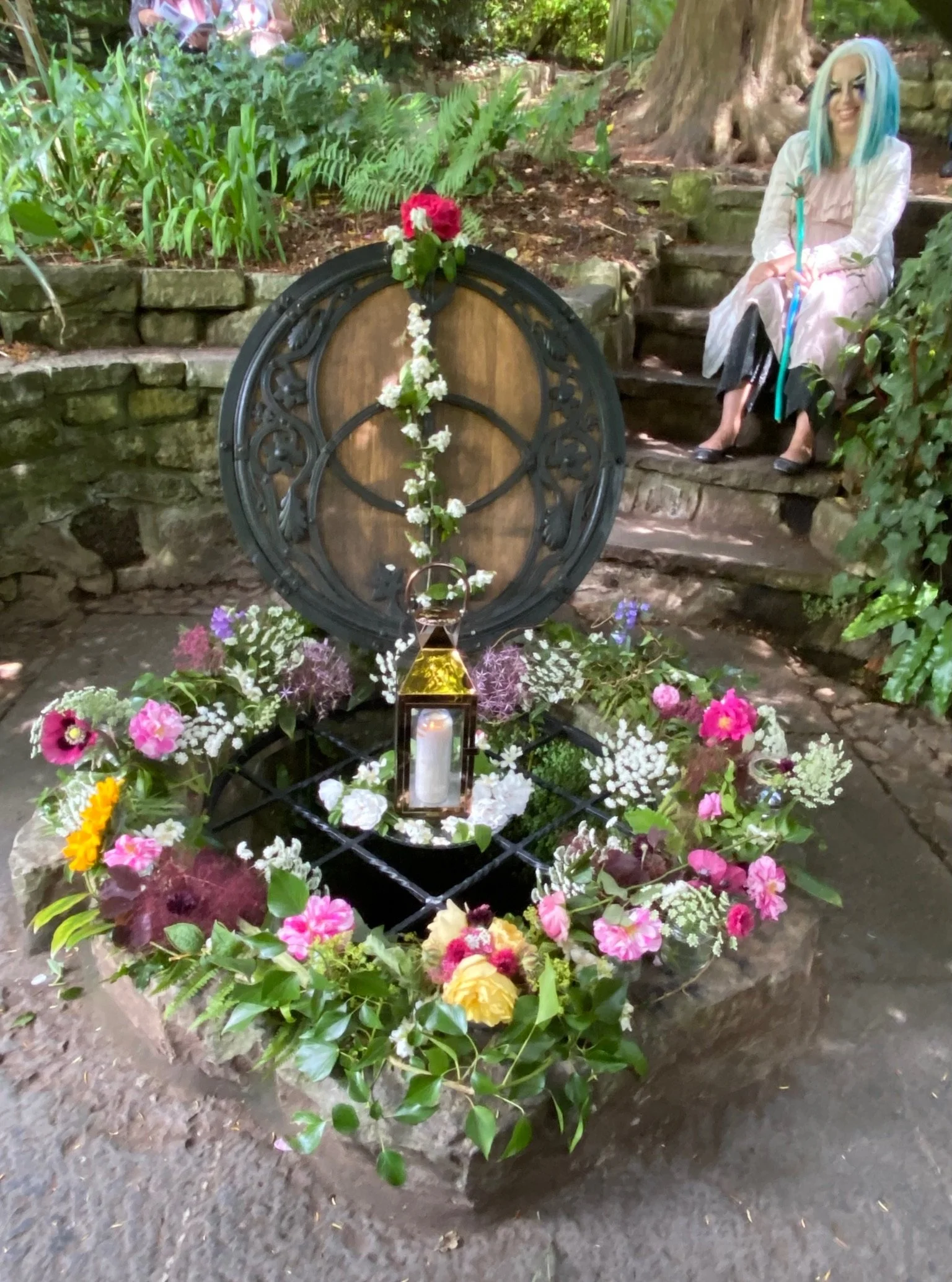 The Chalice Well of Avalon adorned for Summer Solstice