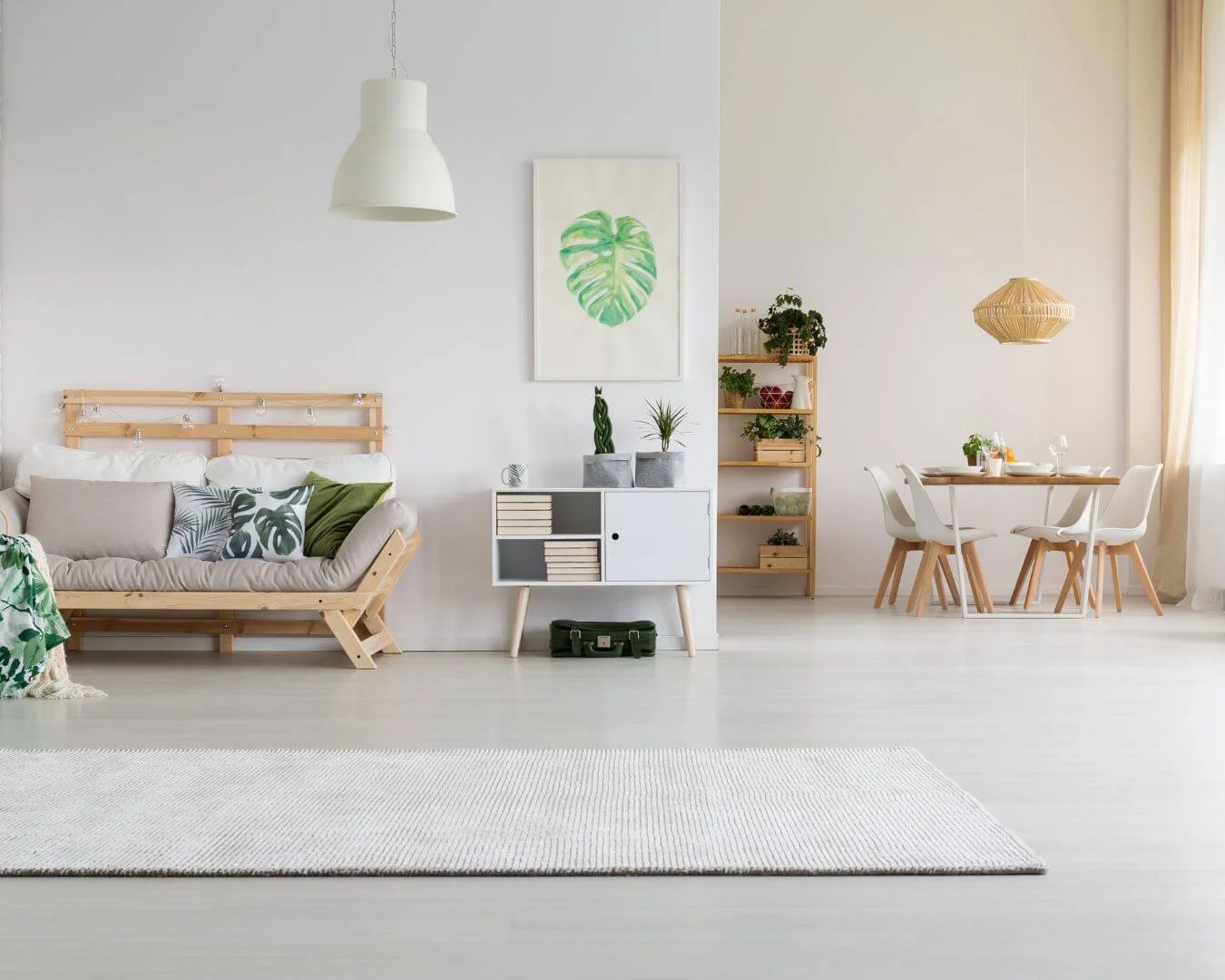 Fresh living room with natural light and a clean sofa