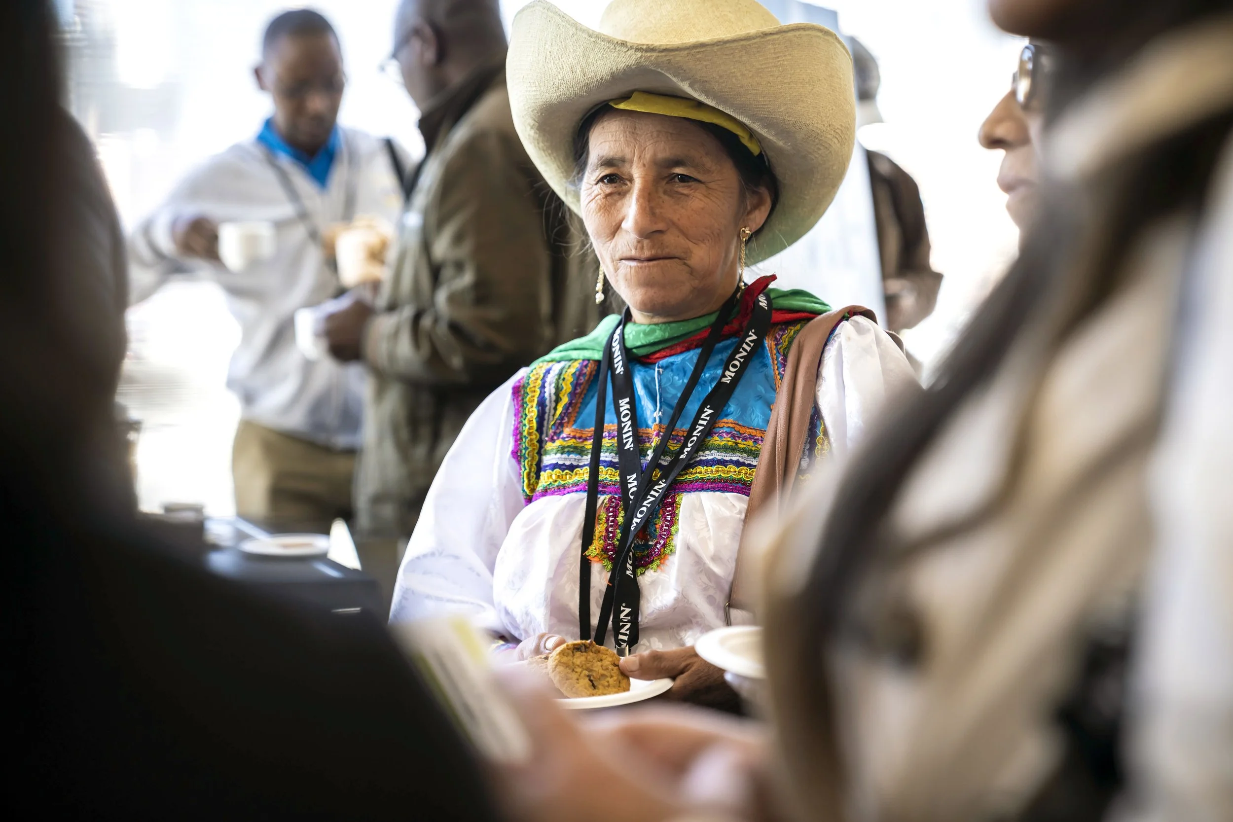 fair trade usa event during the specialty coffee event SCA laughing man lucia bawot photography specialized in coffee industry fotografa colombiana lucia bawot especializada en cafe documentando evento de fair trade usa