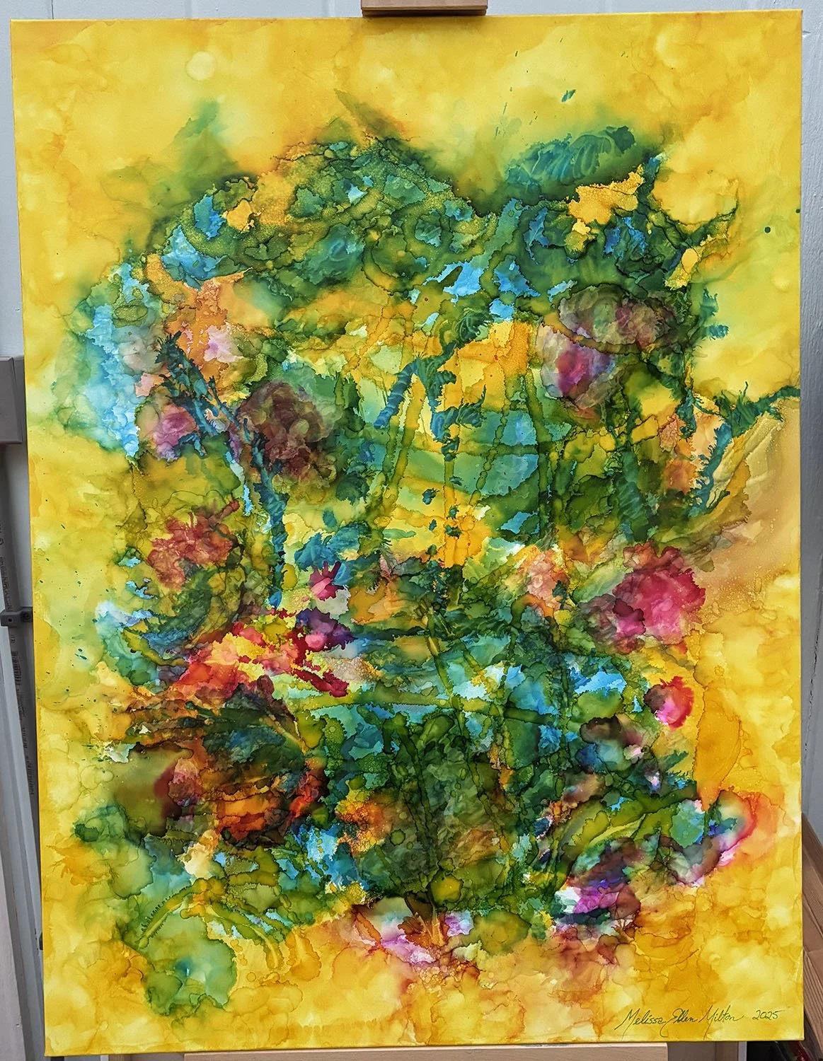 Abstract watercolor painting with yellow, green, blue, pink, and orange colors.