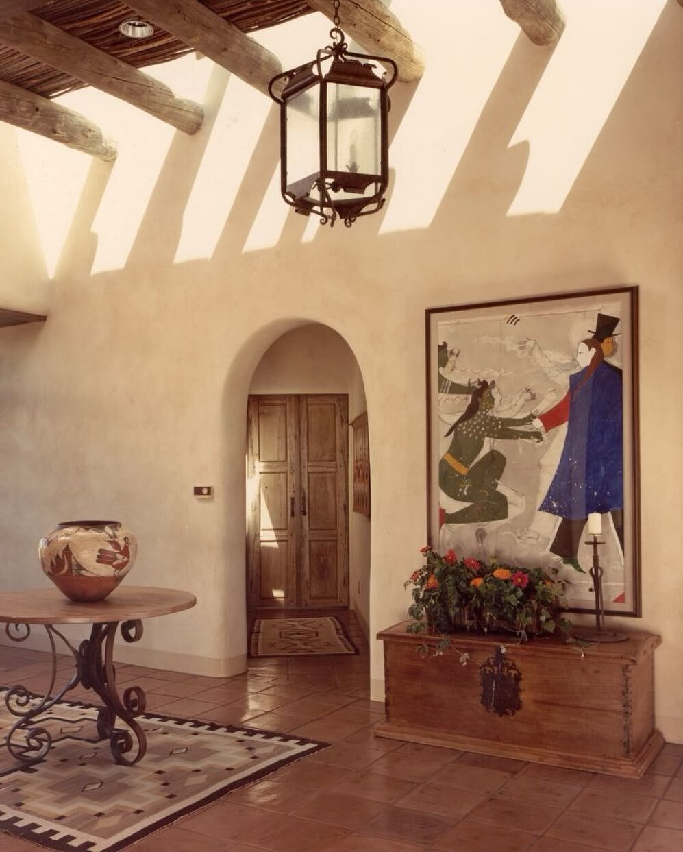 Adobe-style homes author the streets of many southwestern American towns and this Santa Fe ranch house we designed for a client is no exception. The exposed wooden beams are reminiscent of the features most common in this original method of home buil