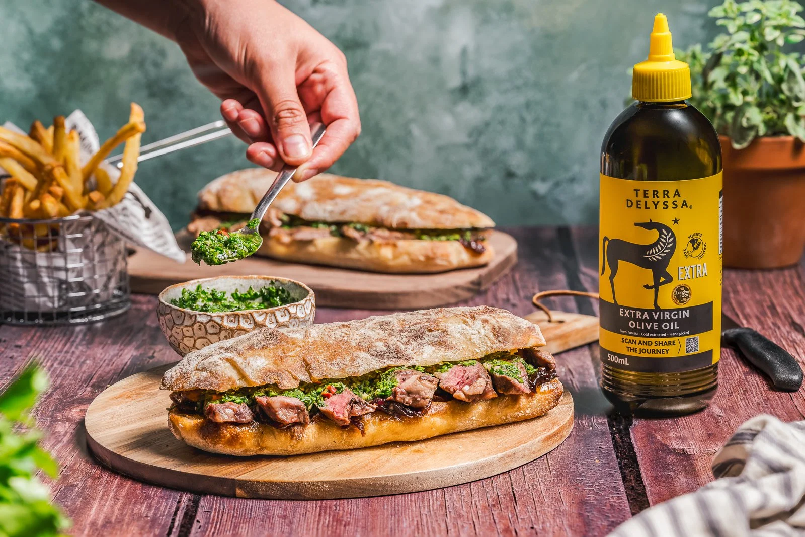 Terra Delyssa steak sandwich, with spoon, landscape, WEB.jpg