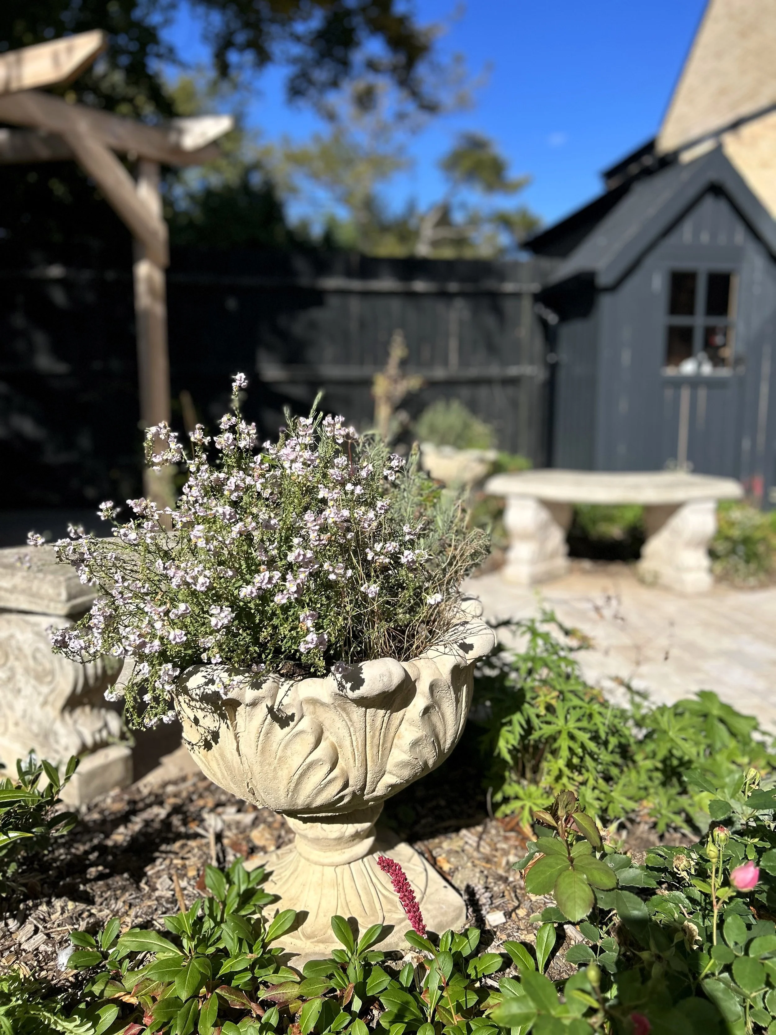 White stone planter and bench
