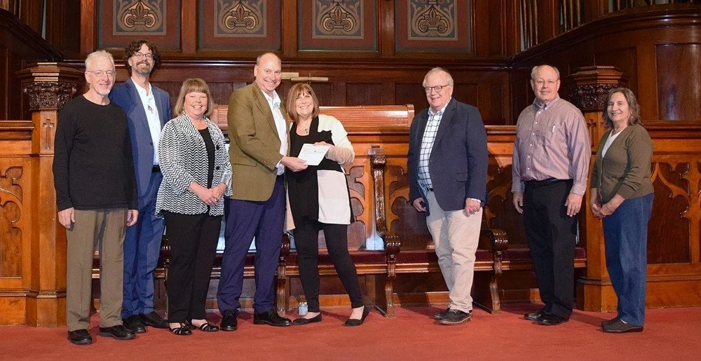Edelman Foundation officers present check to Reid Center executive committee members