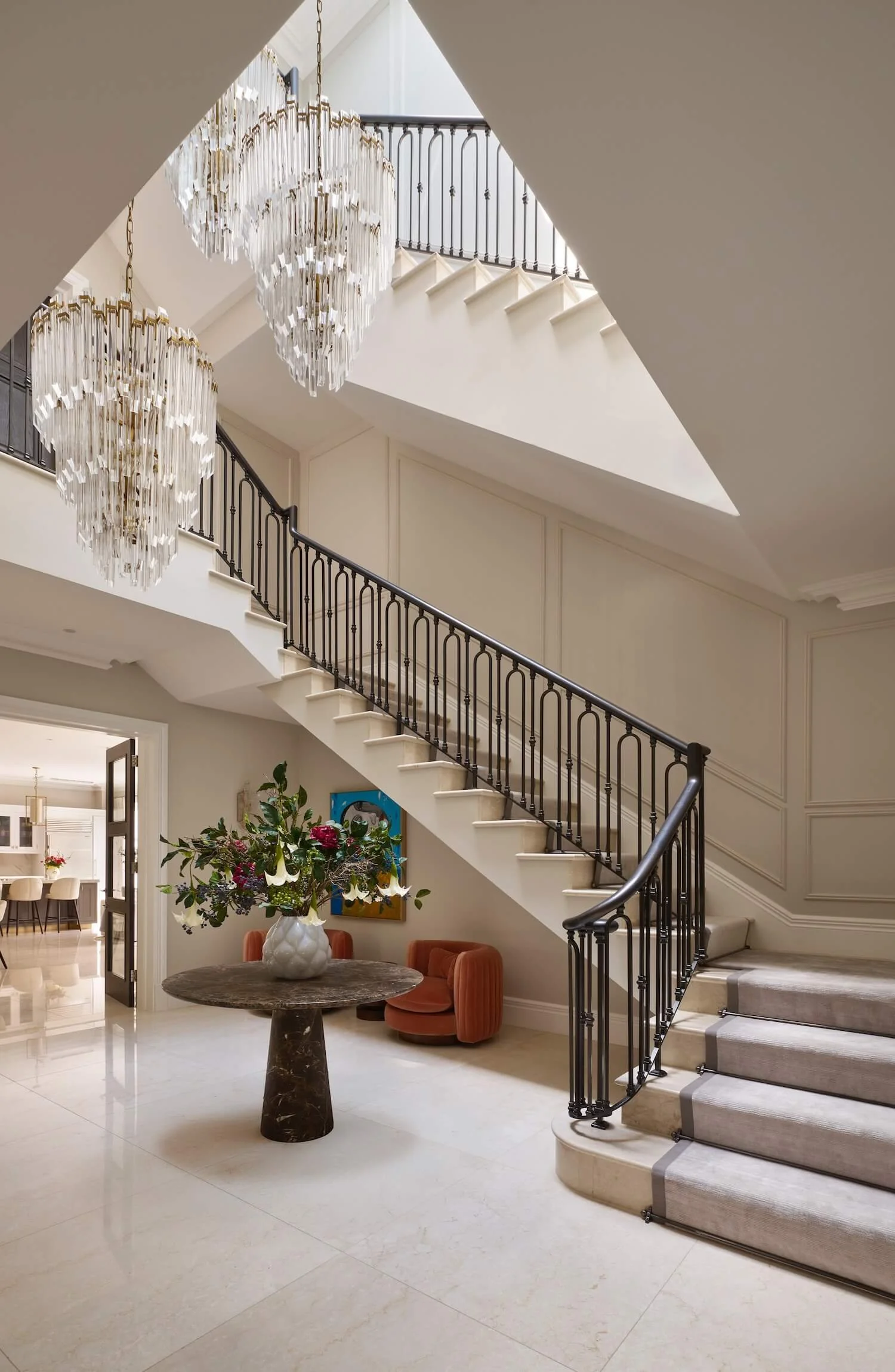 Staircase with chandeliers