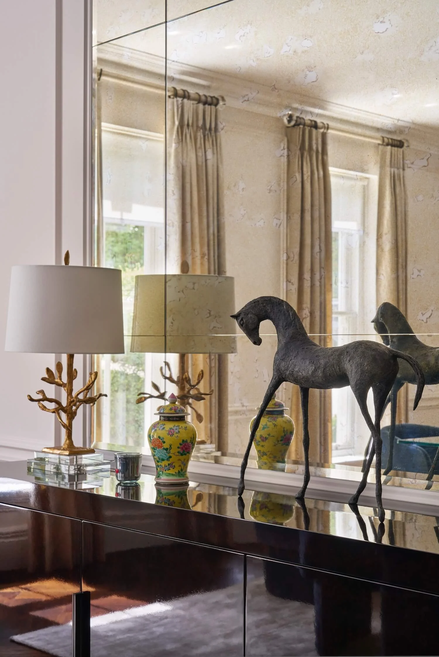 Mirror, lamp and artwork