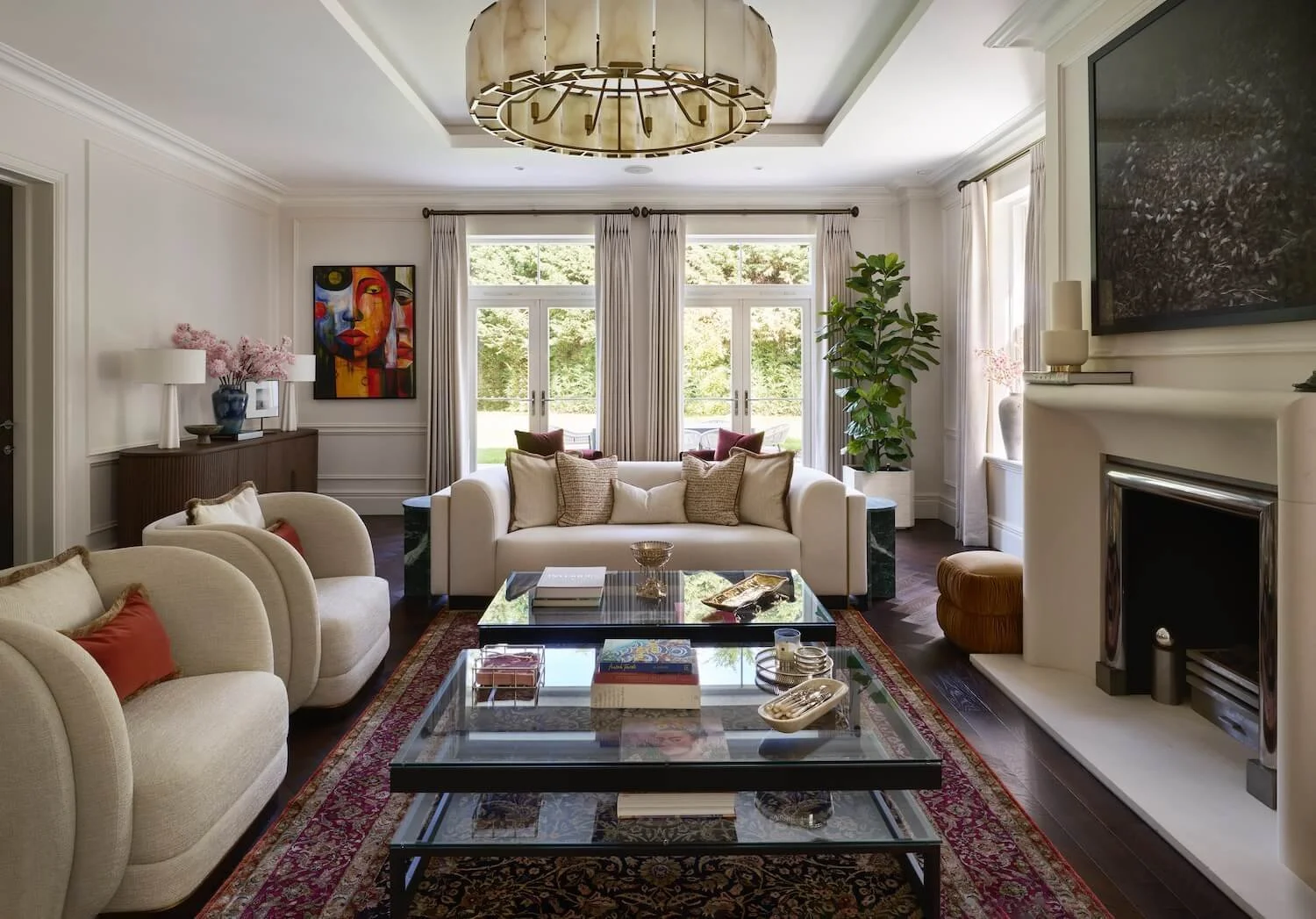 Seating, glass table and Persian rug