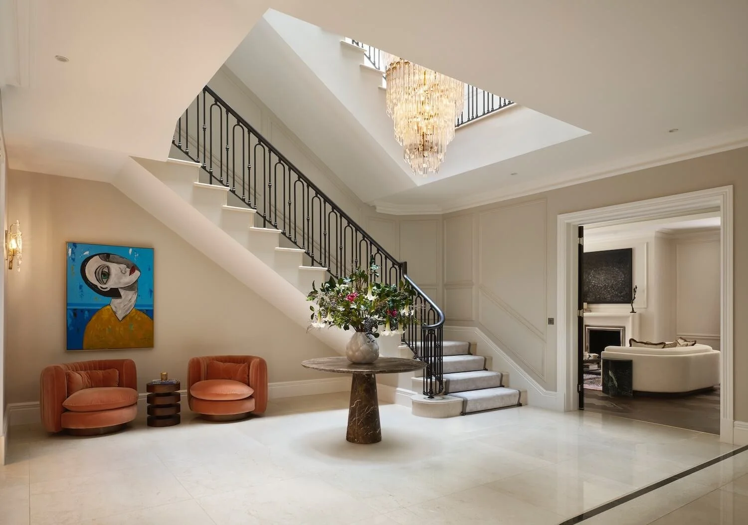 Staircase and door to Living Room