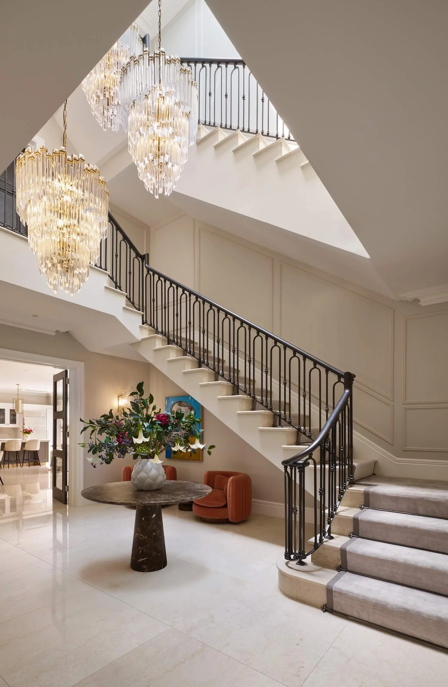Staircase with chandeliers