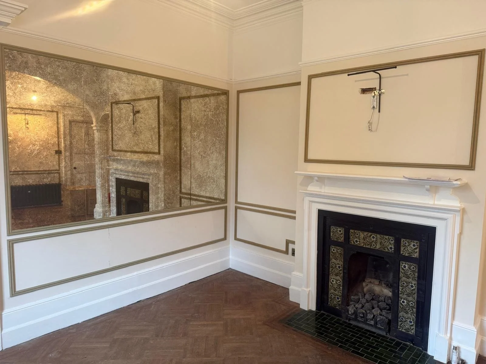 Hallway with mirror and panelling, in progress