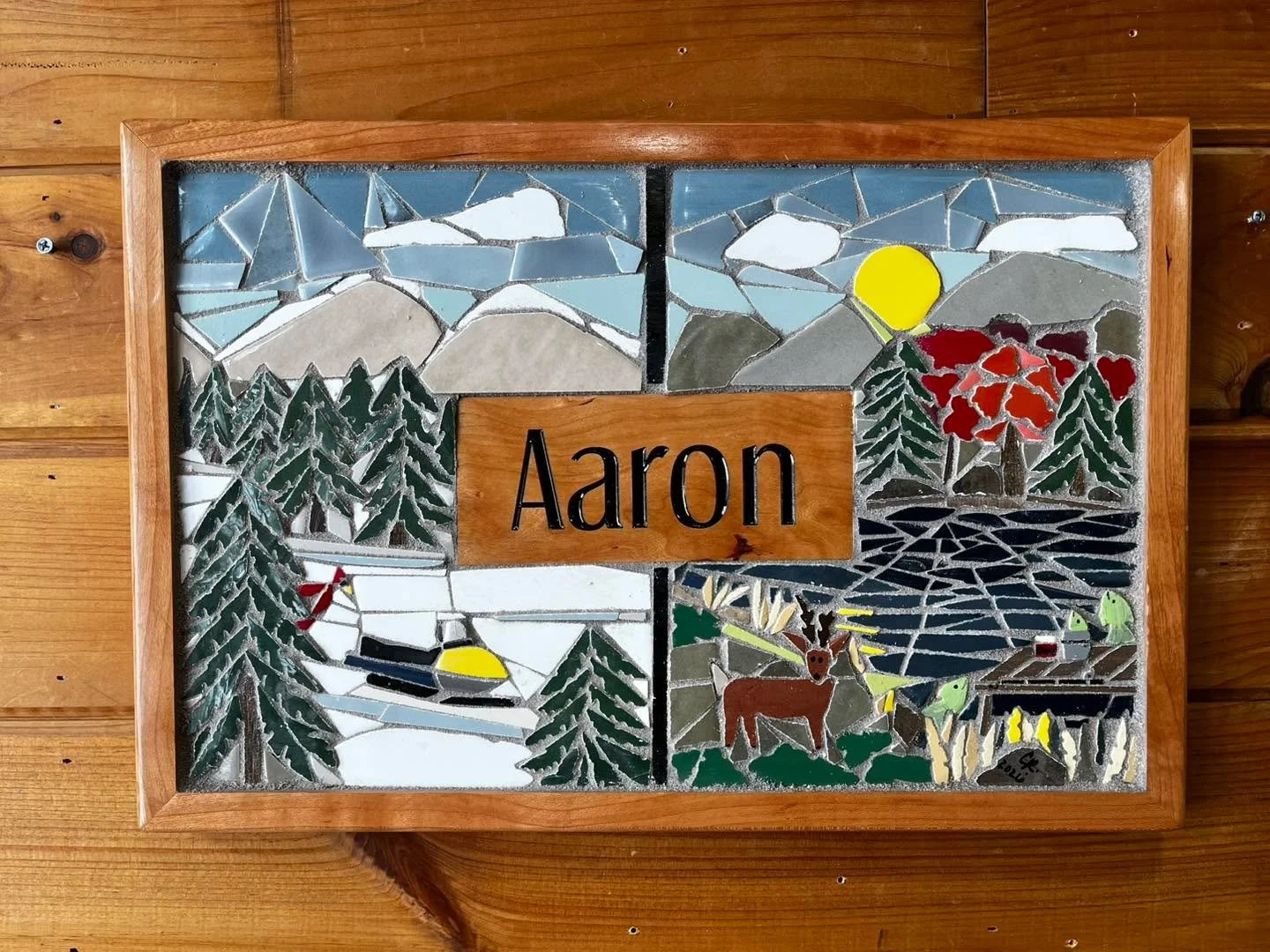 Most often Carolyn will be asked to create a mosaic to celebrate the birth of baby, a wedding or an anniversary.

Yet there are times when a piece has been commissioned to honor the life at the time of passing. 

RIP Aaron.  You loved the outdoors an