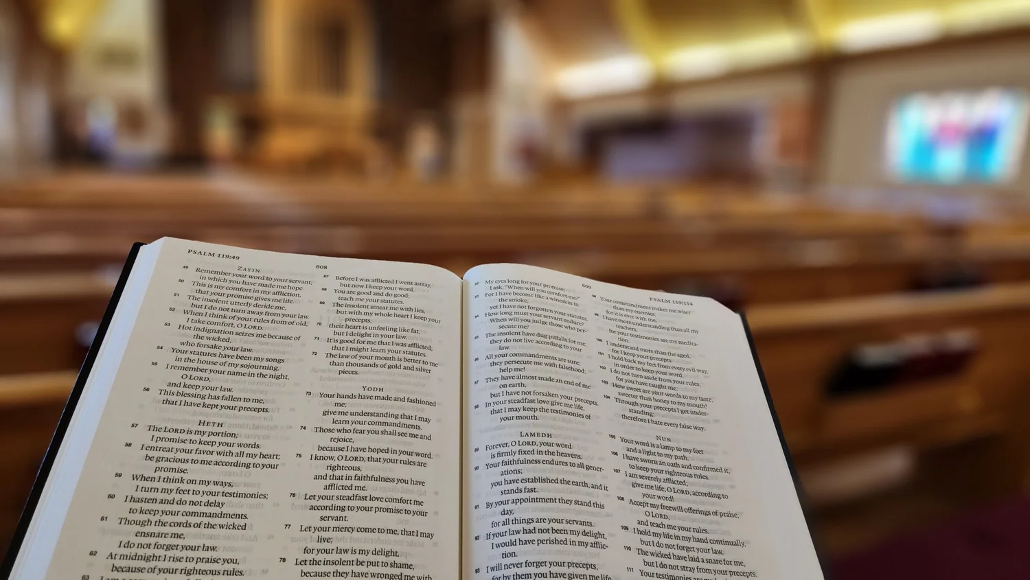 An open Bible held up in the sanctuary at First Reformed