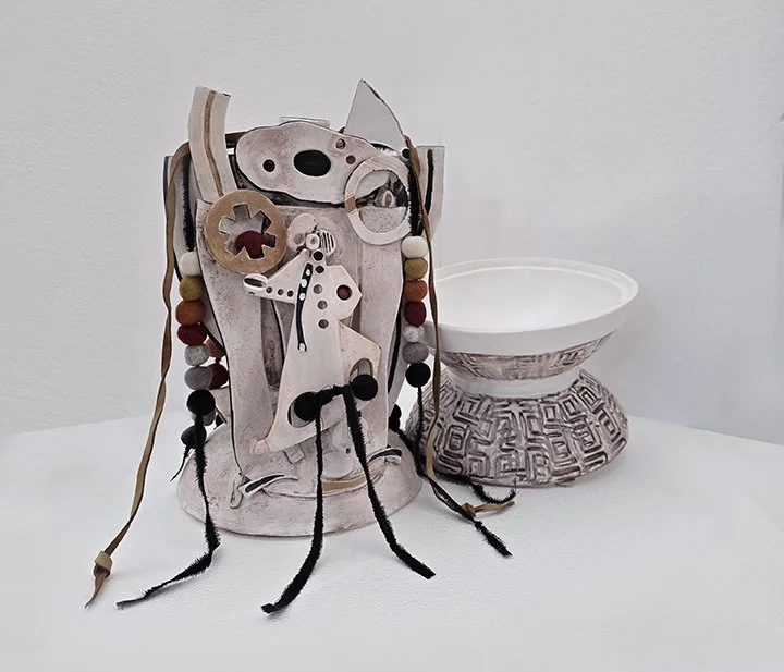 Metamorphosis, 2025, 21.5 x 9.5 in.., porcelain, cotton, wool, leather