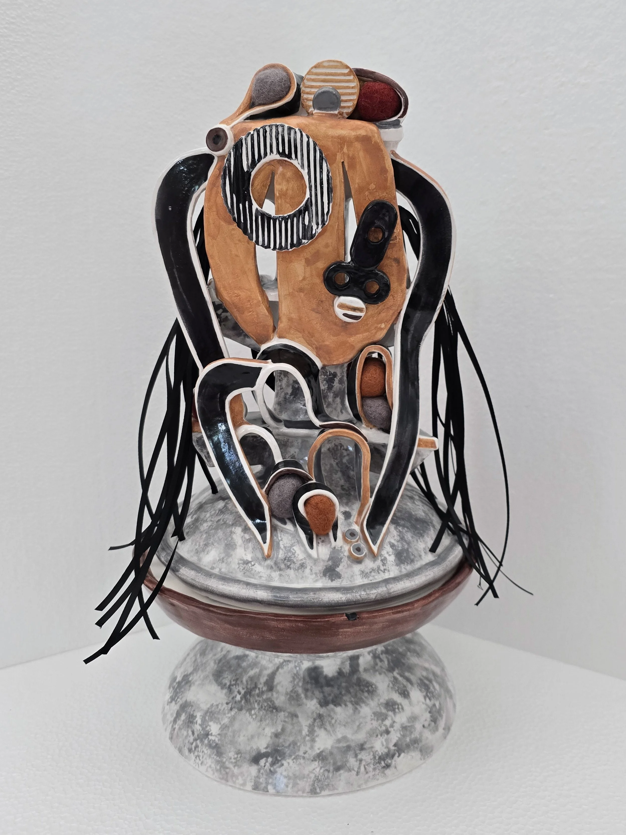 A Creative Mind, 2025, 15.5 x 8.5 in., porcelain, cotton, wool