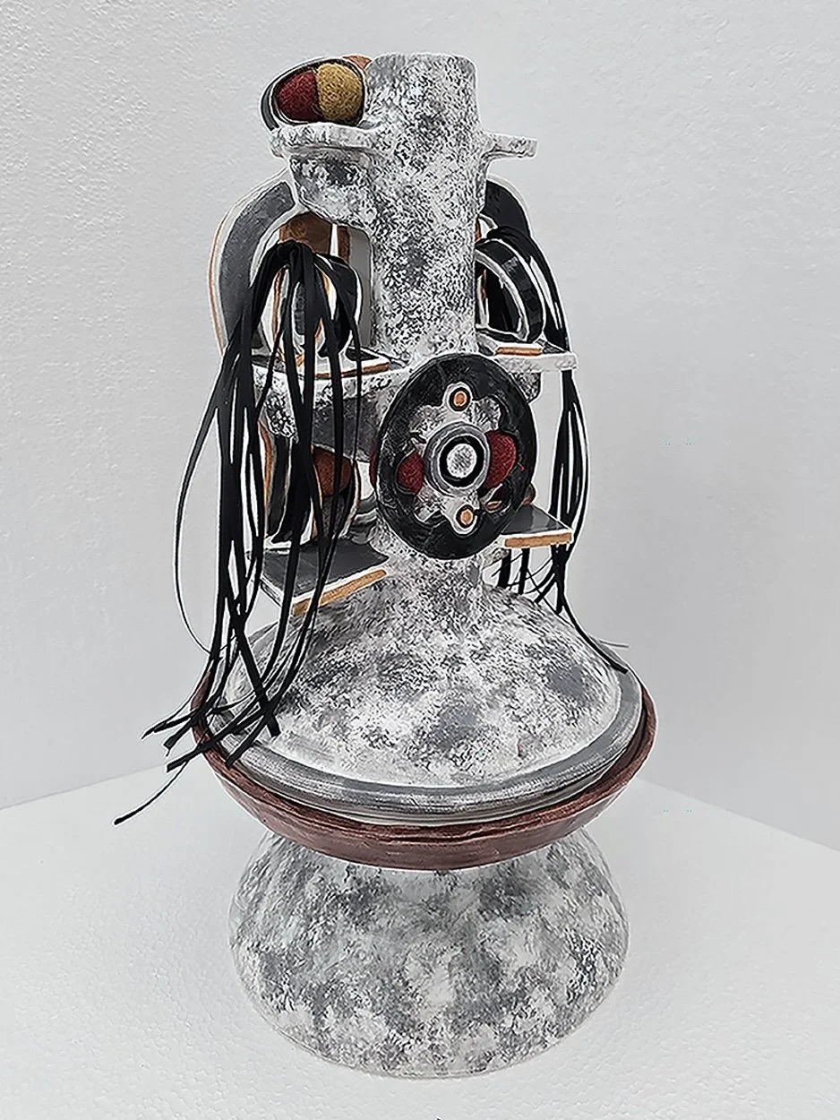 A Creative Mind, 2025, 15.5 x 8.5 in., porcelain, cotton, wool (back)