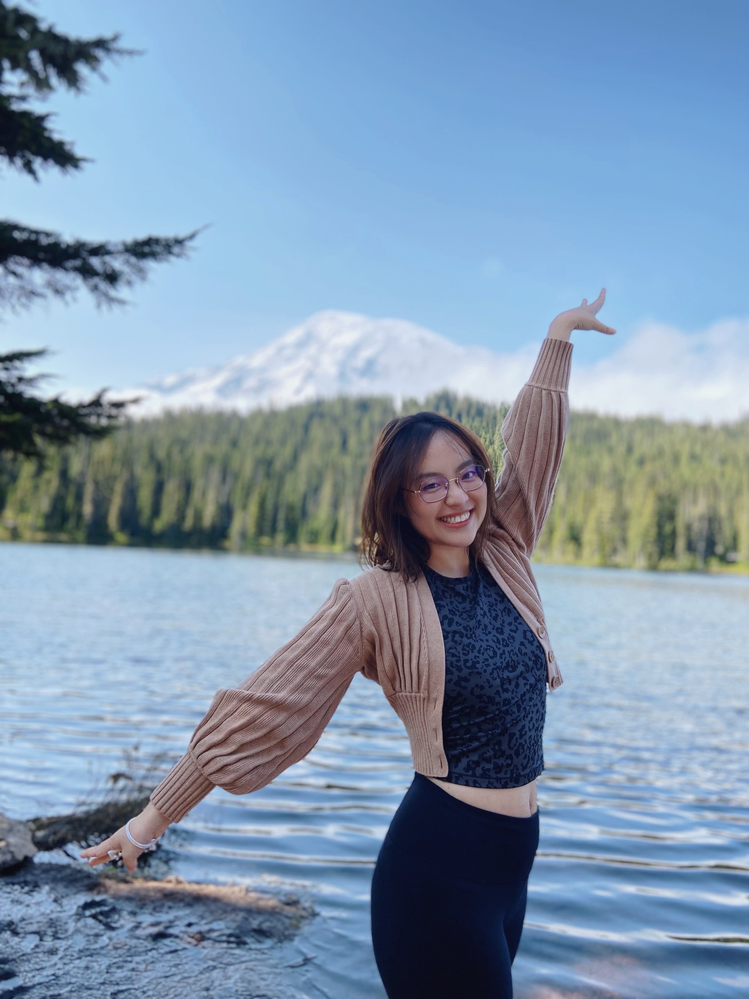 Transformation Life Coach, Effie Cao Dancing in Front of Lake &amp; Mountain