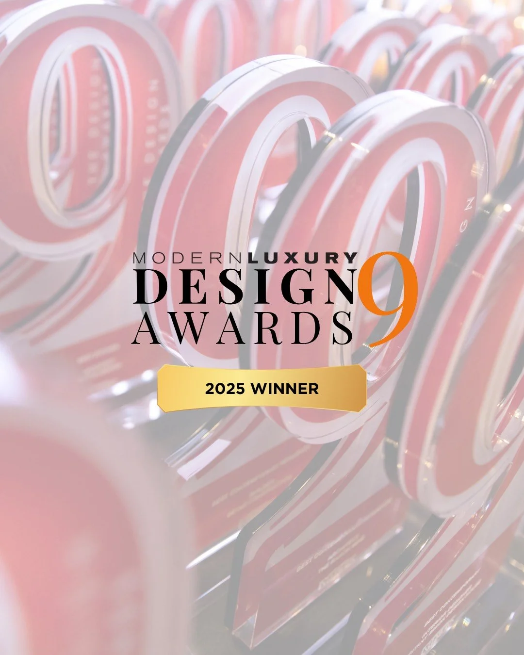 A transparent award featuring the text 'Modern Luxury Design Awards 9' with a yellow banner that says '2025 Winner', set against a background of pink and white award trophies.