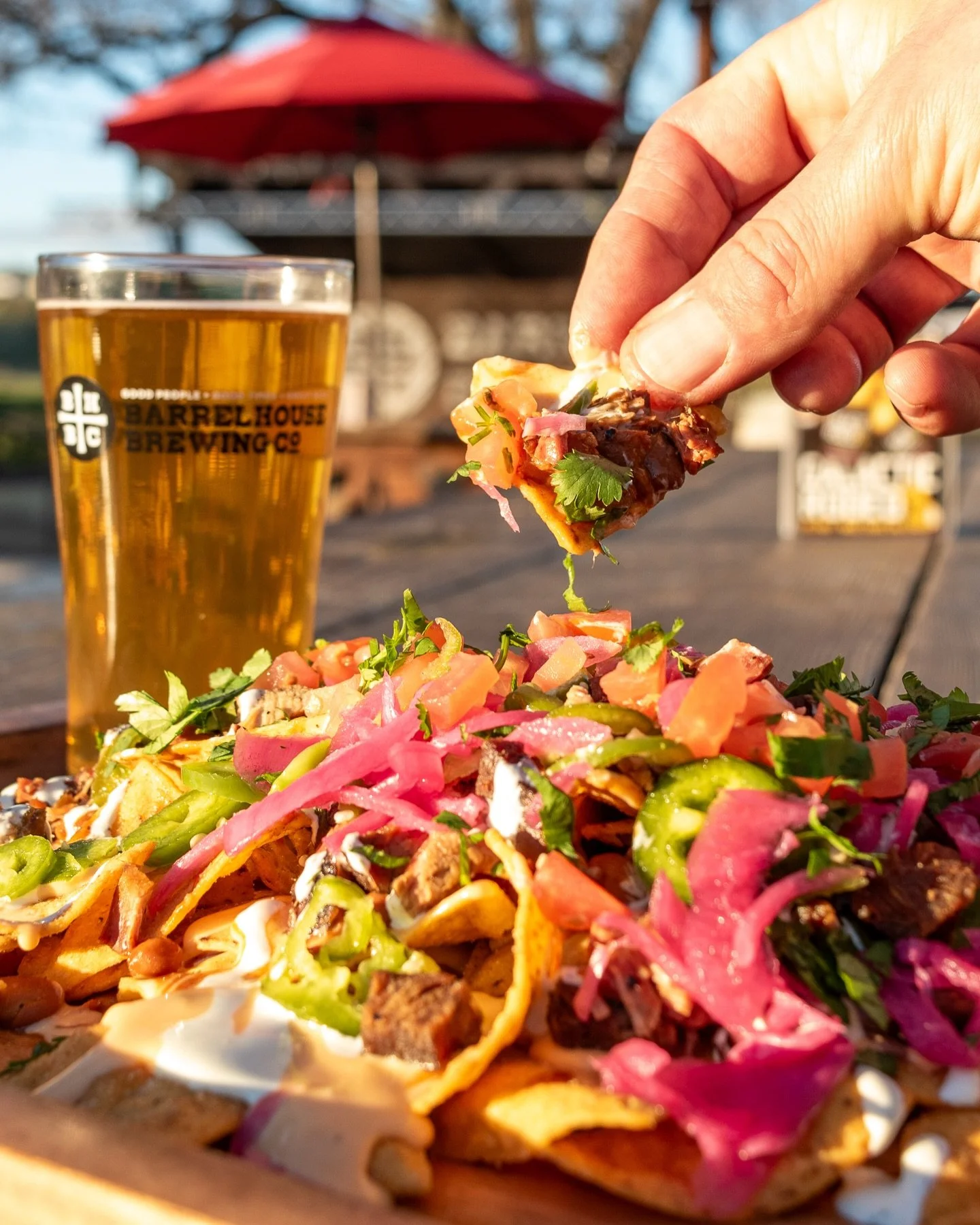 Crispy chips, IPA-melted fontina, chili, pickled jalape&ntilde;os, and cilantro-lime crema&mdash;one bite of these Smash N Roll nachos and everything else fades to the background. 🔥🙌🏼

Grab a cold BarrelHouse beer and dig in.

#nachos #ipacheese #