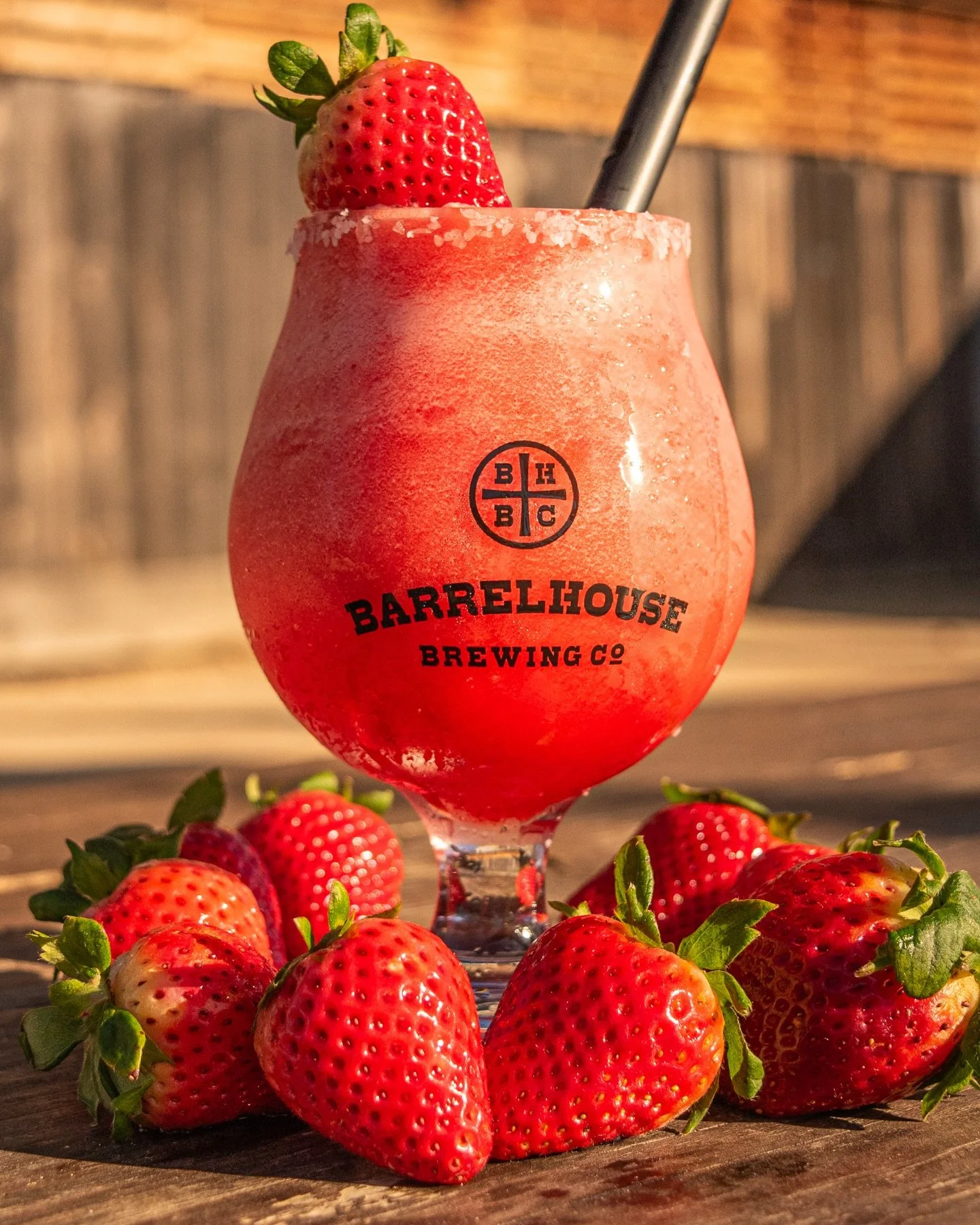 You walk in with that late-afternoon sun still on your shoulders. Patio buzzing, music rolling, someone you know waving you over. 

The blender kicks up and a frosty pour hits the cup. First sip and it&rsquo;s there &mdash; ripe strawberry, a clean l