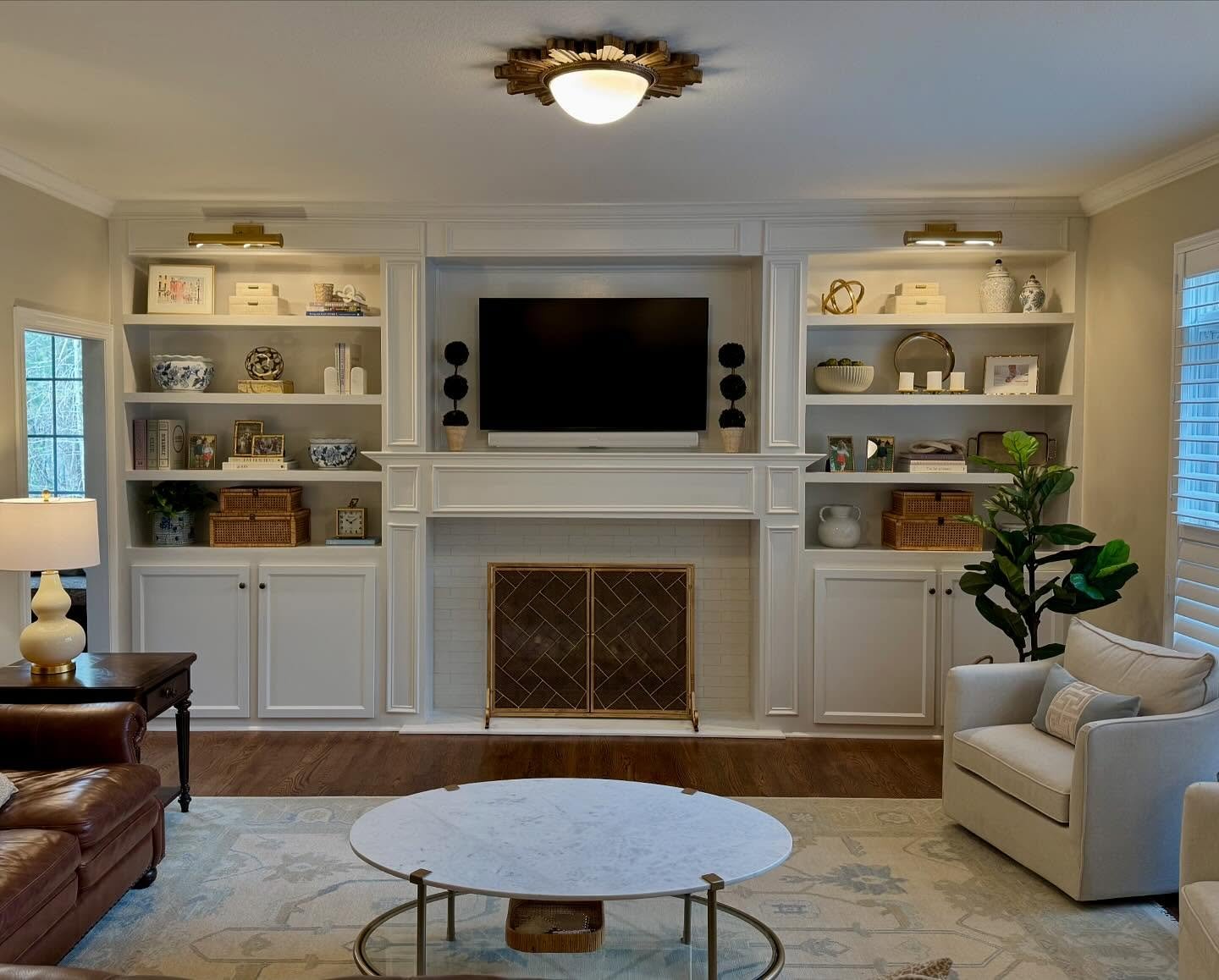 a pretty little glow up for this clients&rsquo; living room! added built-ins, a new rug and lots of fun shelf decor. just wish I had a before to show the difference 😆! ✨