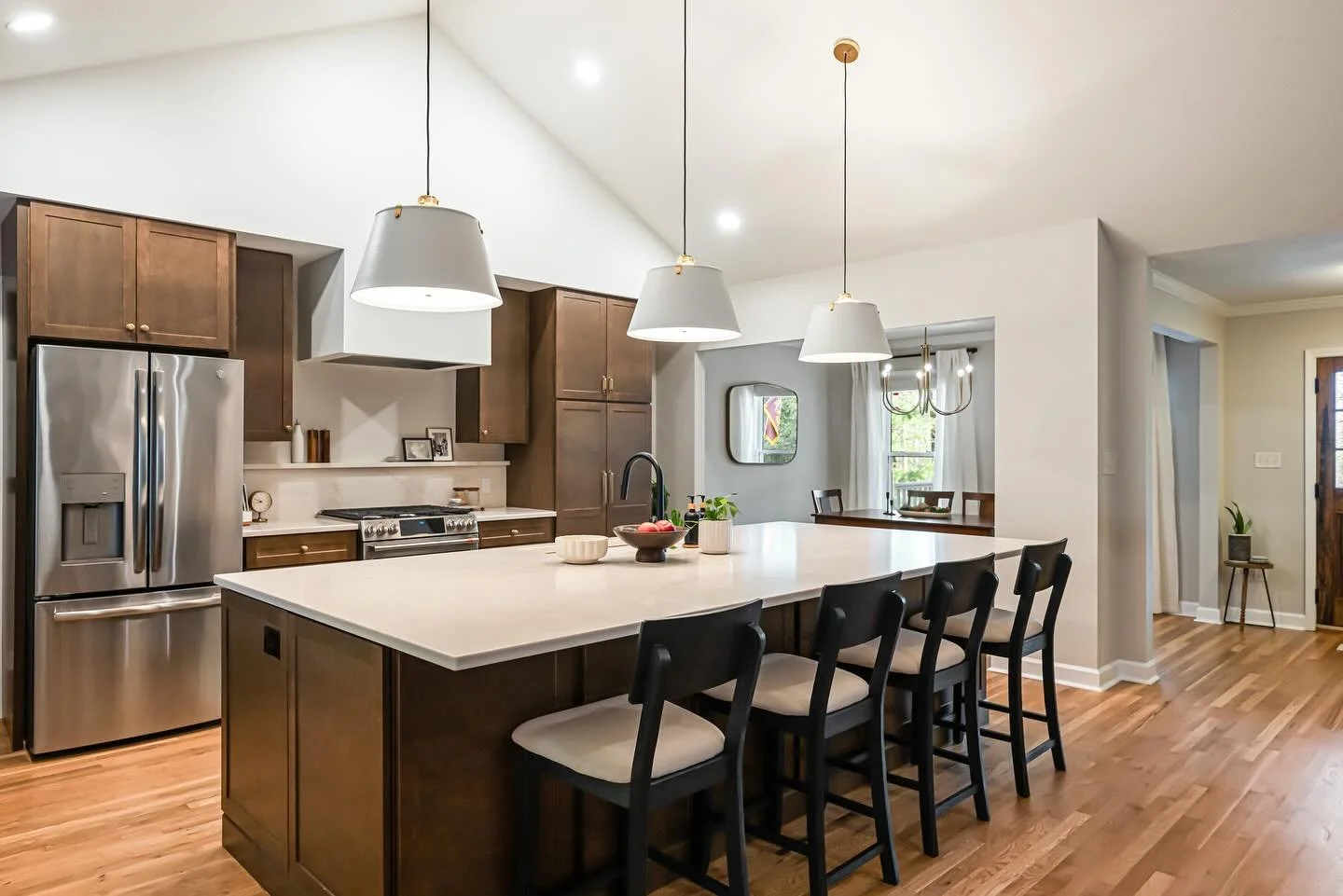 I need to remind myself throughout every project to document the transformation along the way! This was a major renovation &mdash; we knocked down walls, created new cased openings, added a very cool soffit/hood enclosure above the range wall, reconf