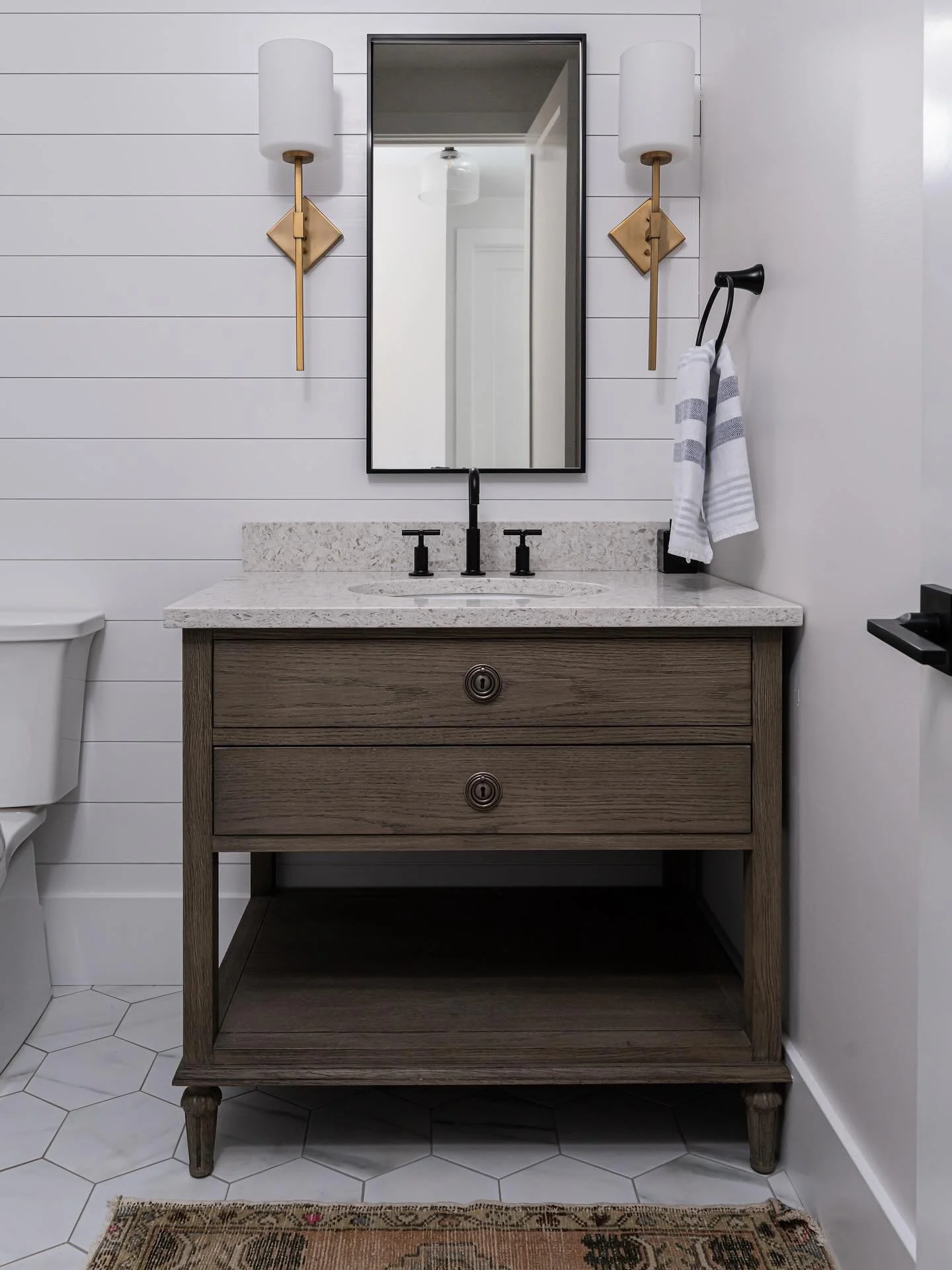 Is #tbt still a thing? Doubt it, but here is a sweet powder/guest bath from 2019 that still shines in 2025 🤍

📷 by @ryantheedephotography 
Construction by @judd.builders 
#ashevilleinteriordesigner