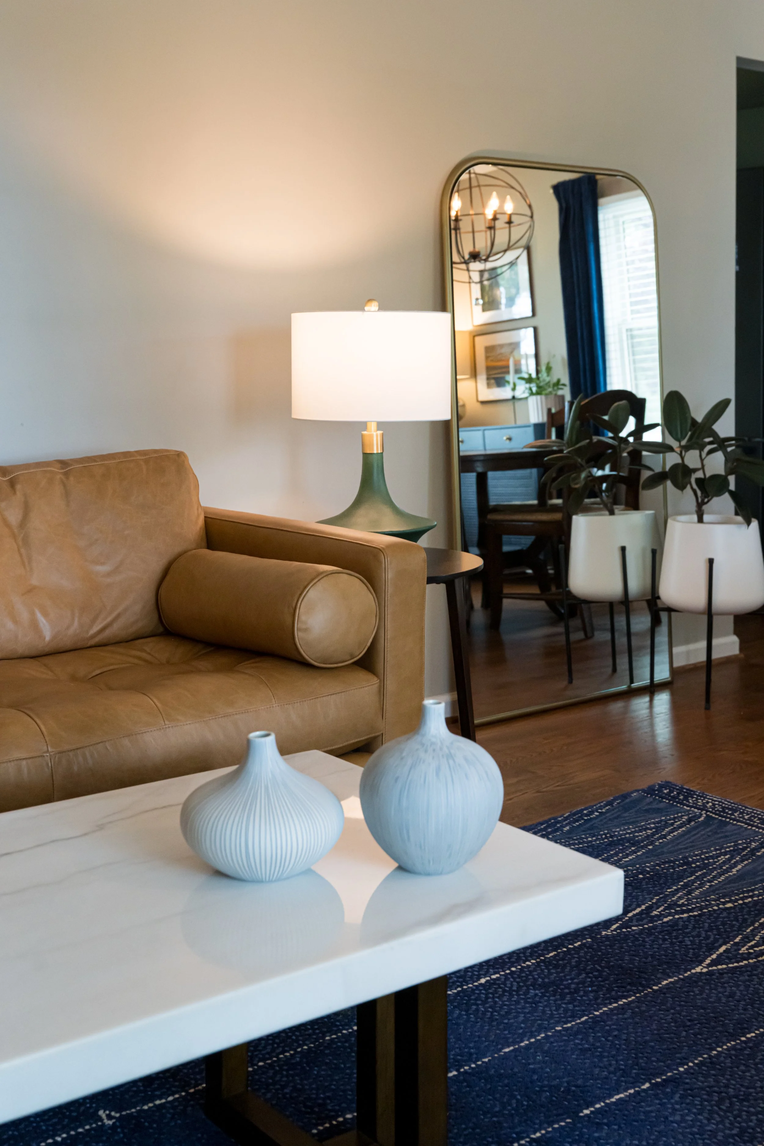 Photo by Ryan Theede Photography - Mid-century colorful living room and dining room