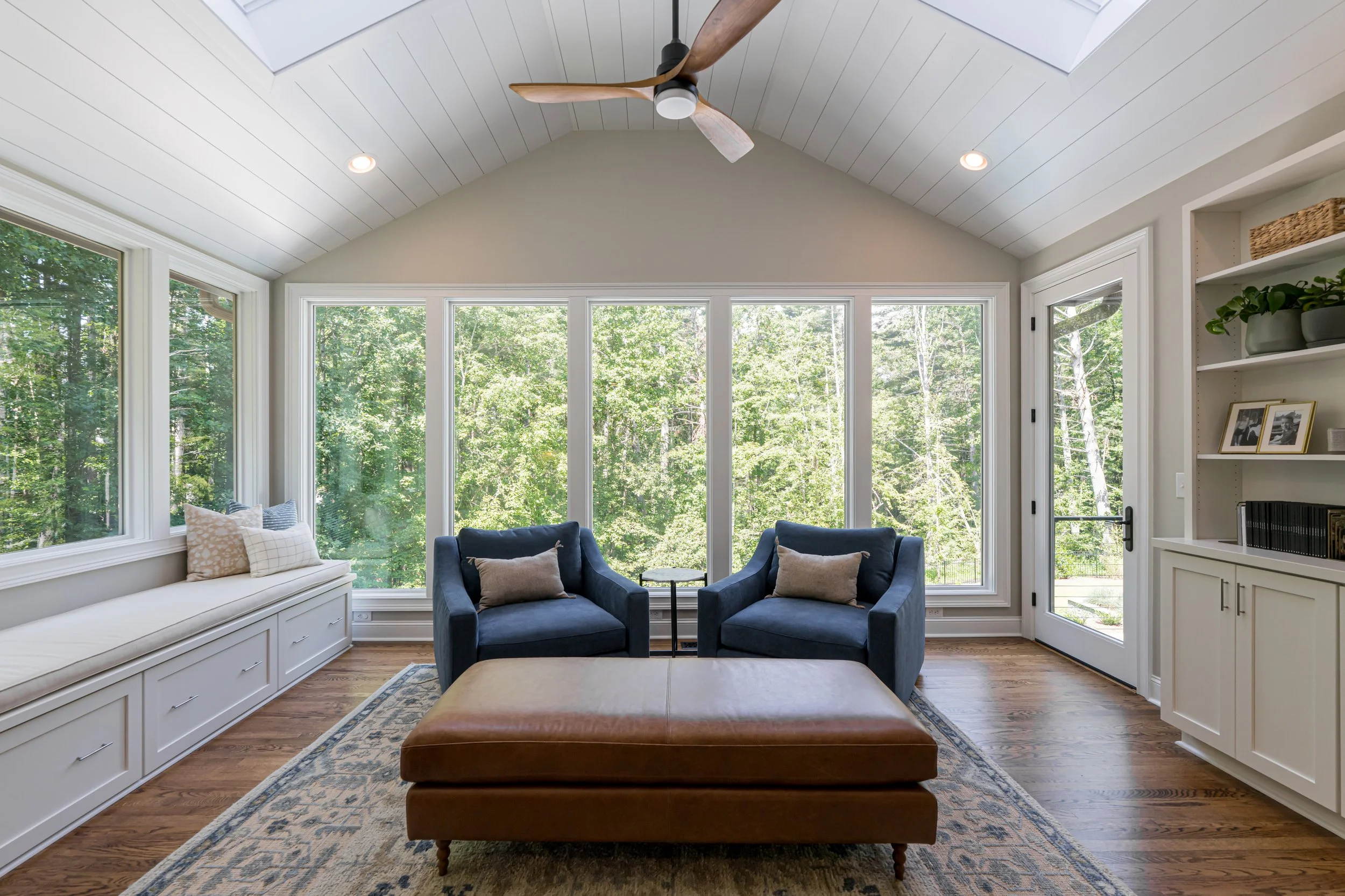 Photo by Ryan Theede Photography - Asheville Interior Design; Classic meets modern primary sunroom