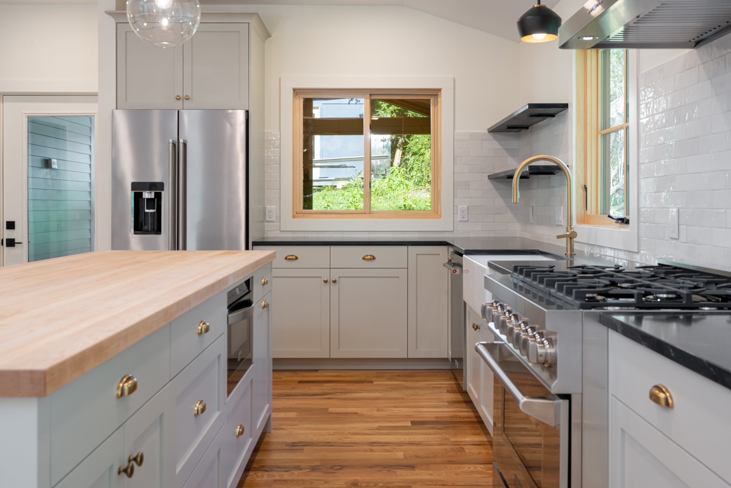 Construction by Lobo Builders - Photo by Ryan Theede Photography - Asheville Interior Design - Modern Bungalow - Kitchen Renovation - Butcher Block