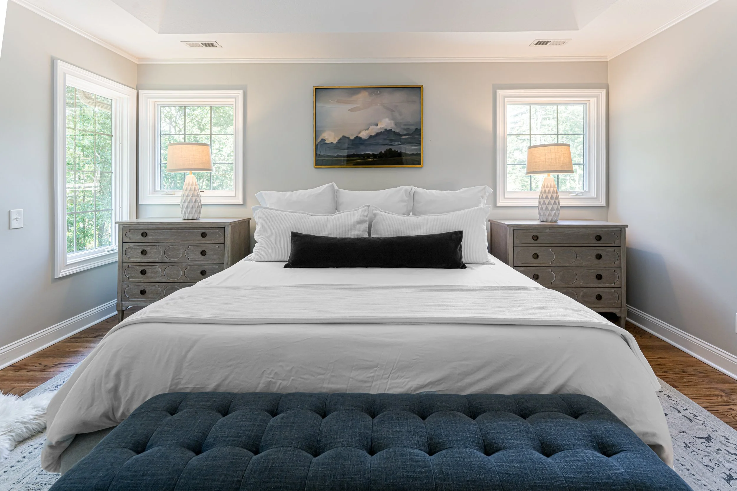 Photo by Ryan Theede Photography - Asheville Interior Design; Classic meets modern primary bedroom