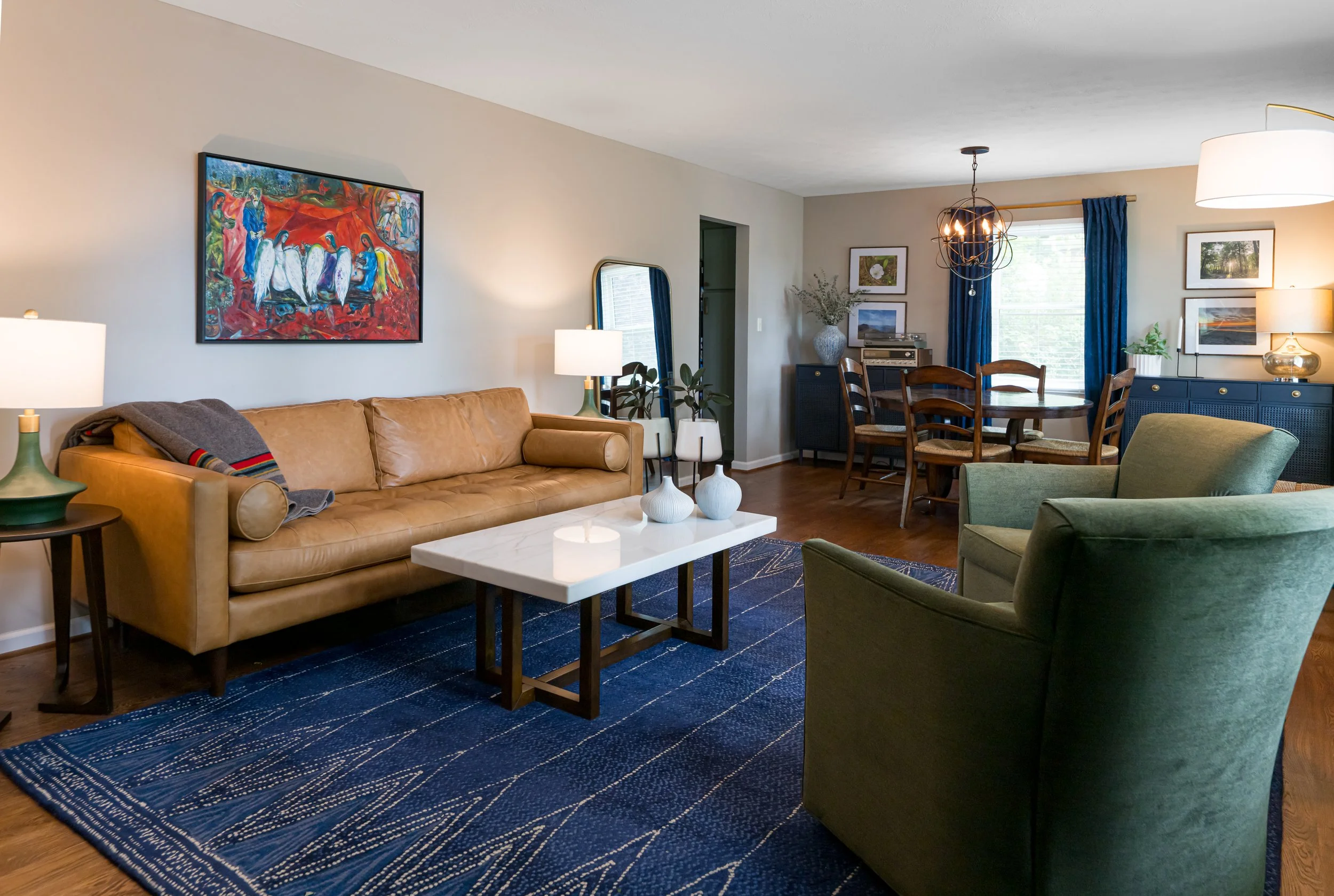 Photo by Ryan Theede Photography - Mid-century colorful living room and dining room
