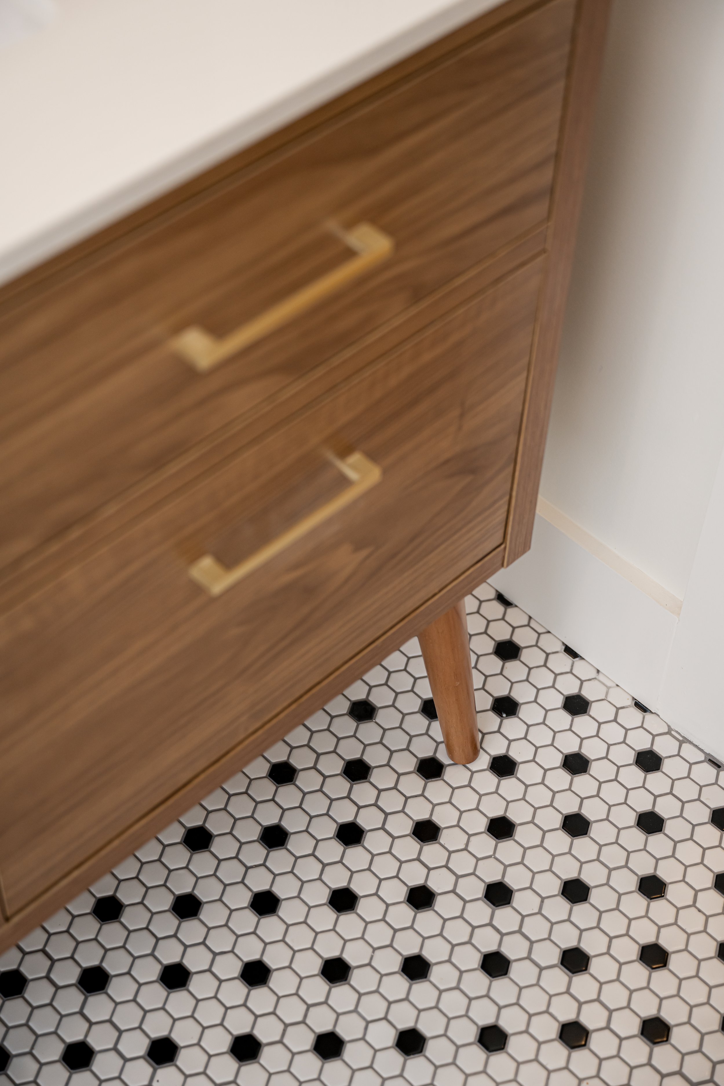 Construction by Lobo Builders - Photo by Ryan Theede Photography - Asheville Interior Design - Bungalow Renovation - Classic tile + Midcentury Bathroom Vanity