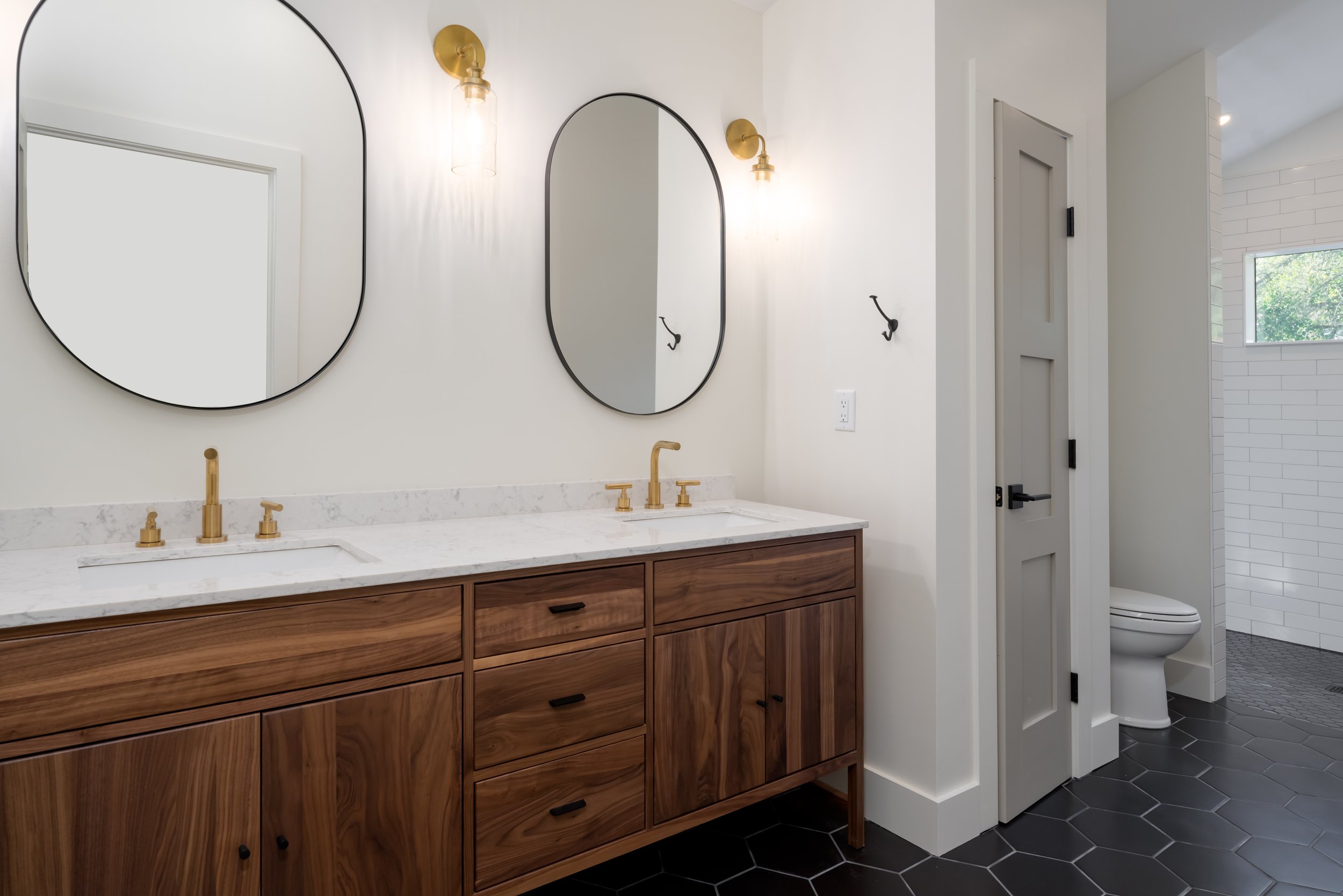 Construction by Lobo Builders - Photo by Ryan Theede Photography - Asheville Interior Design - Bungalow Renovation - Walnut Vanity Modern