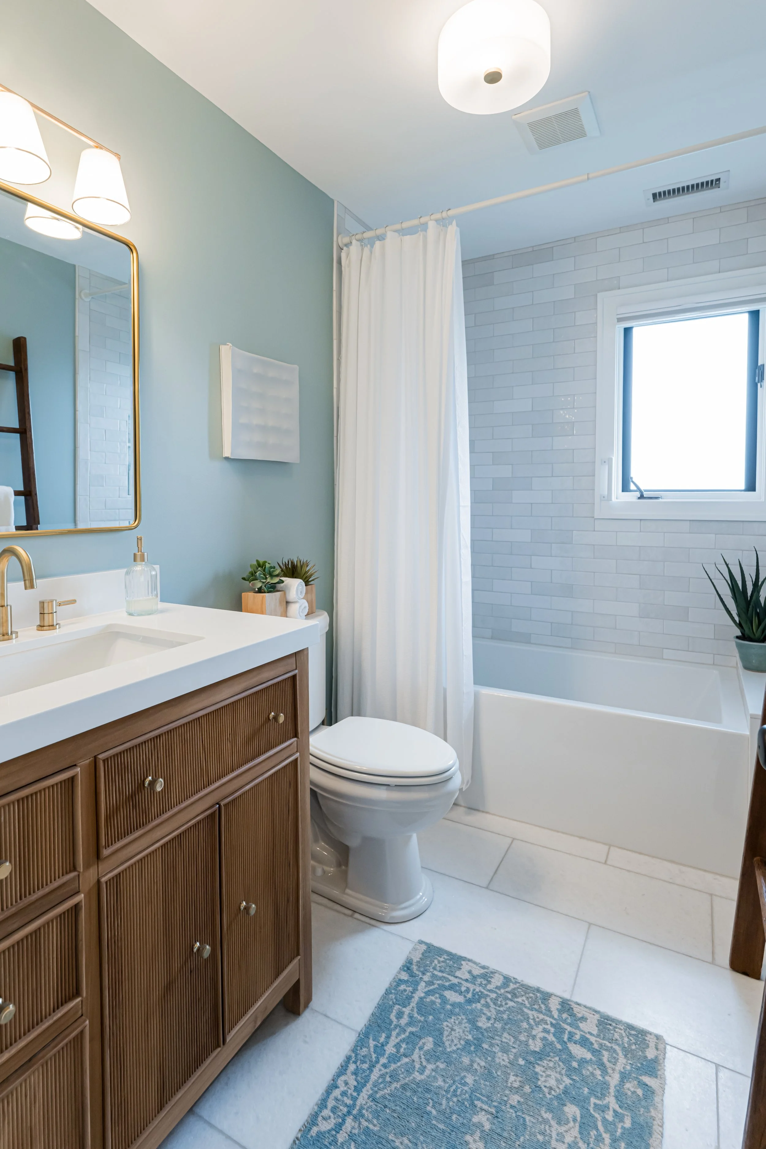 Photo by Ryan Theede Photography - Modern colorful cottage bathroom - Asheville, NC Interior Design
