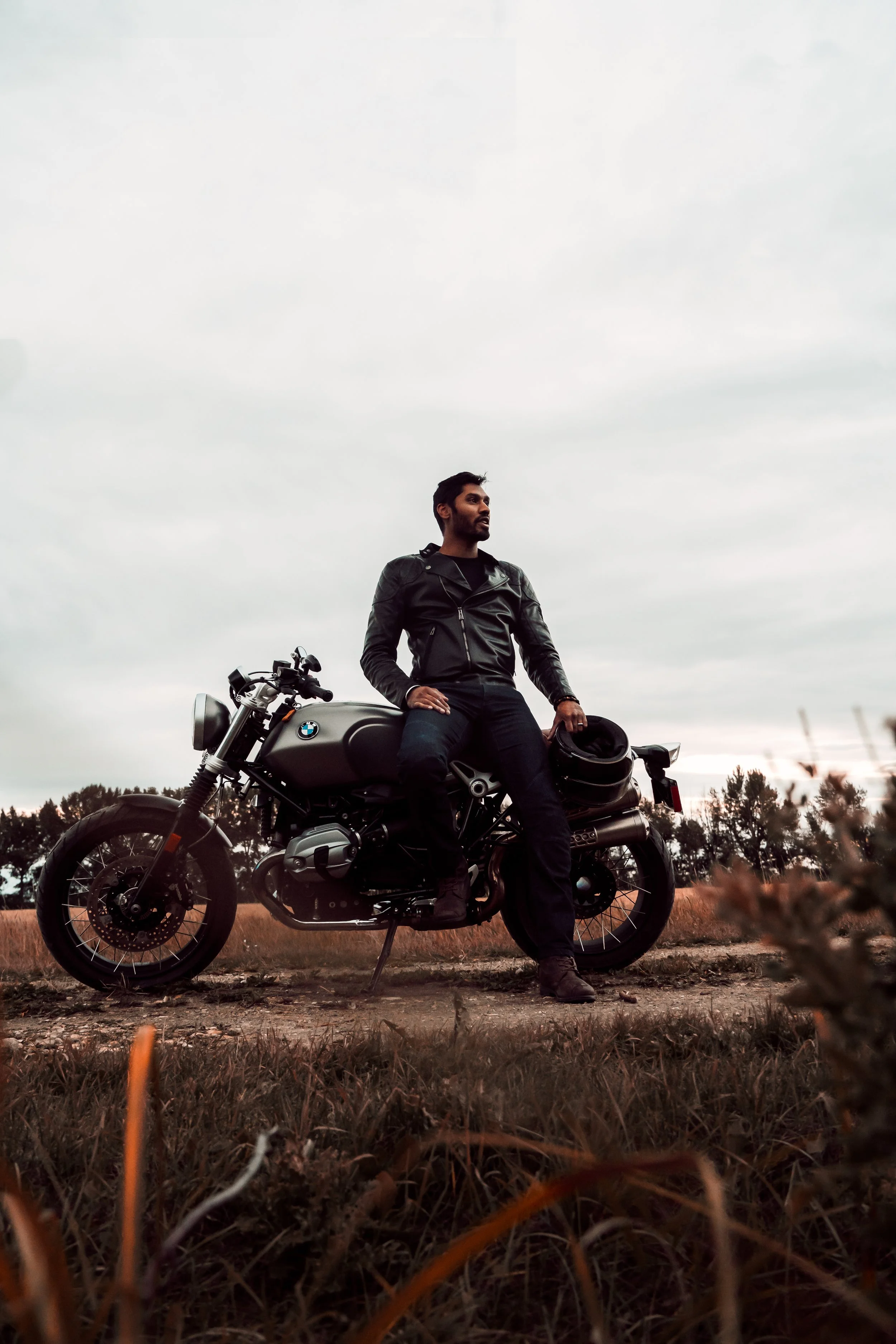 Man resting on his motorbike | Edmonton motorcycle photographer DarkShark Media
