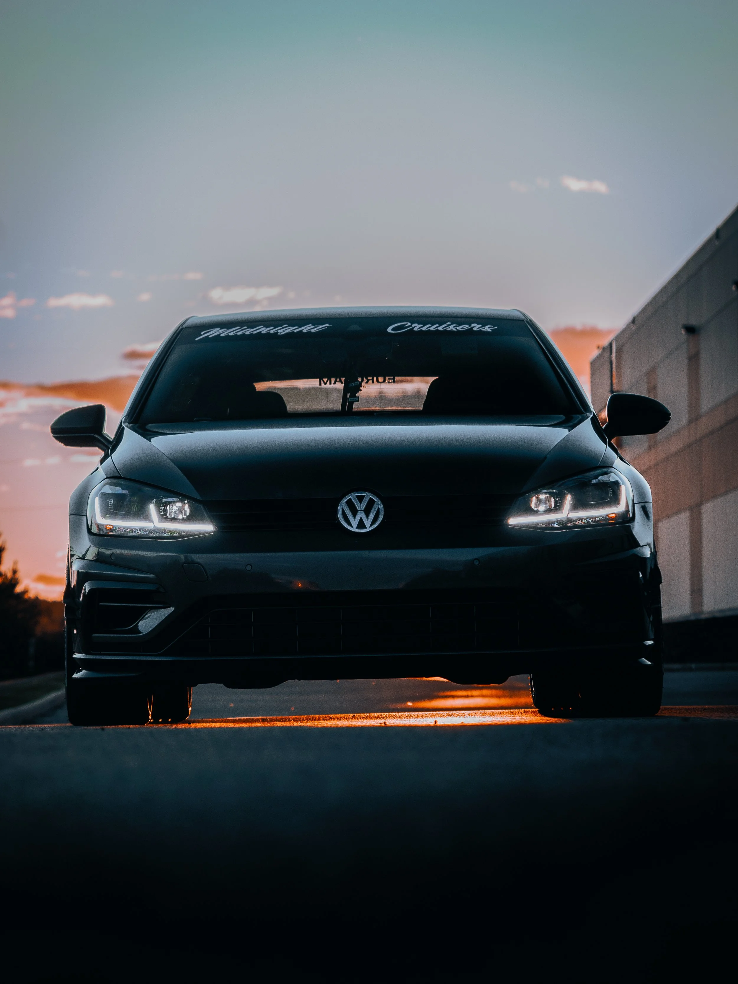 Volkswagen Golf with sun setting in background | Edmonton automotive photographer DarkShark Media