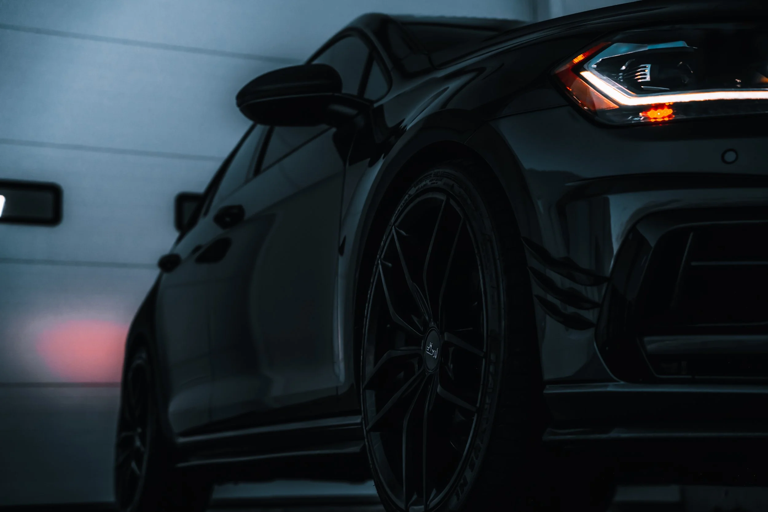 Volkswagen Golf photographed from the ground with lights on | Edmonton automotive photographer DarkShark Media