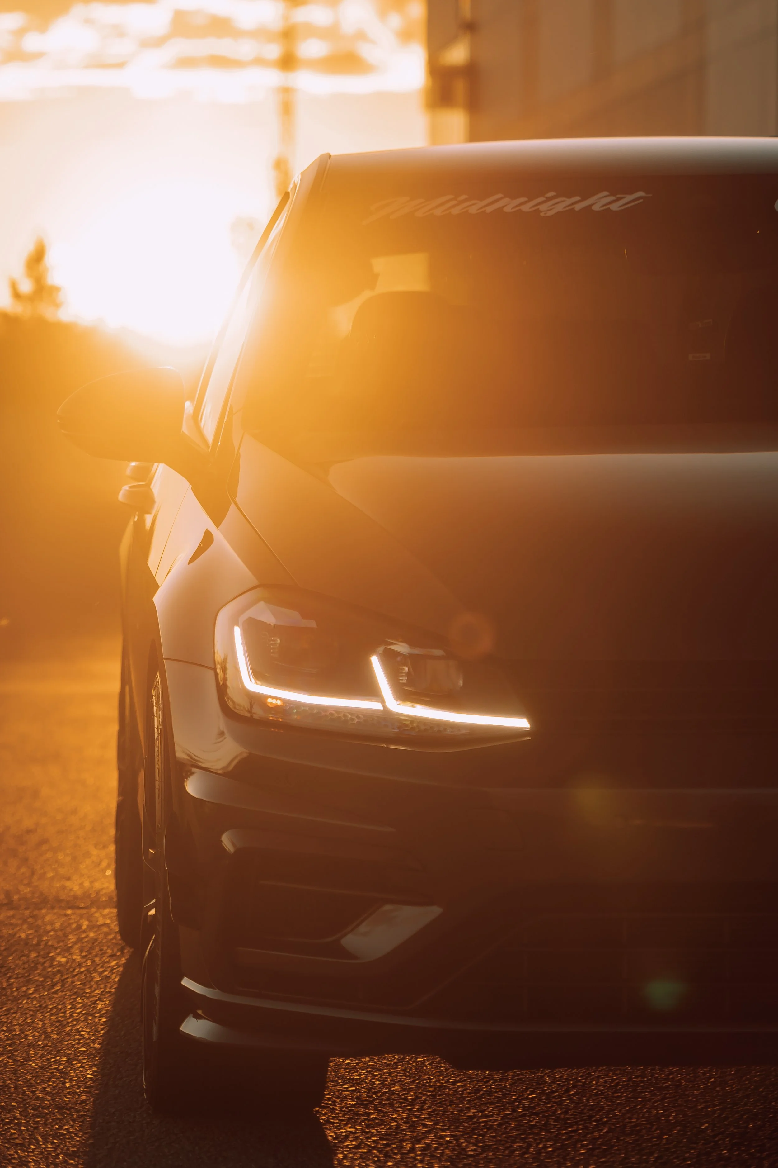 Backlit Volkswagen Golf at sunset | Edmonton automotive photographer DarkShark Media