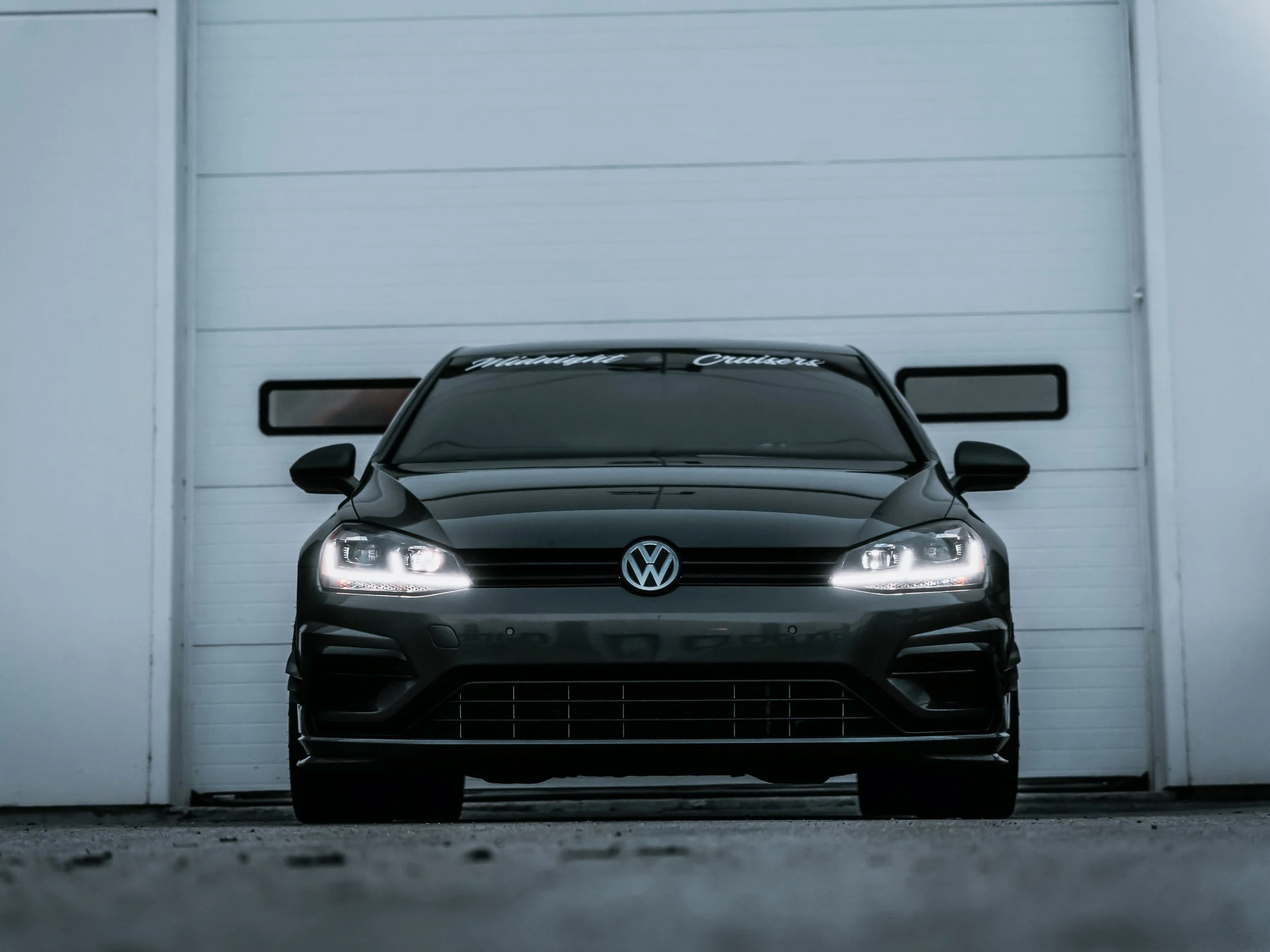 Volkswagen Golf head on shot in front of warehouse | Edmonton automotive photographer DarkShark Media