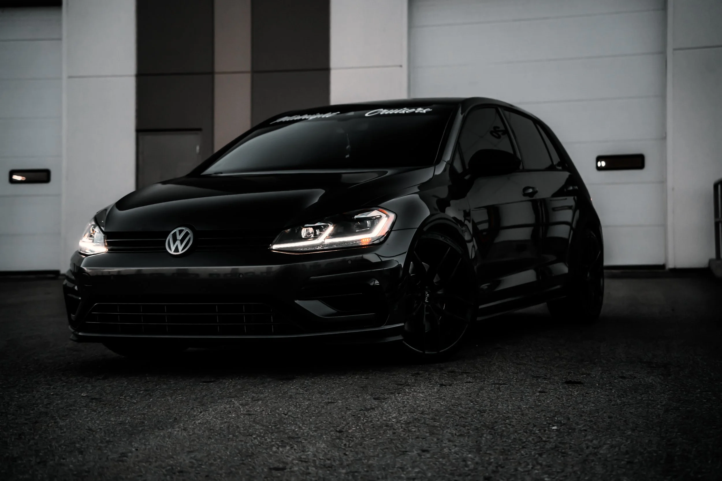 Volkswagen Golf parked on angle in front of bay door | Edmonton automotive photographer DarkShark Media