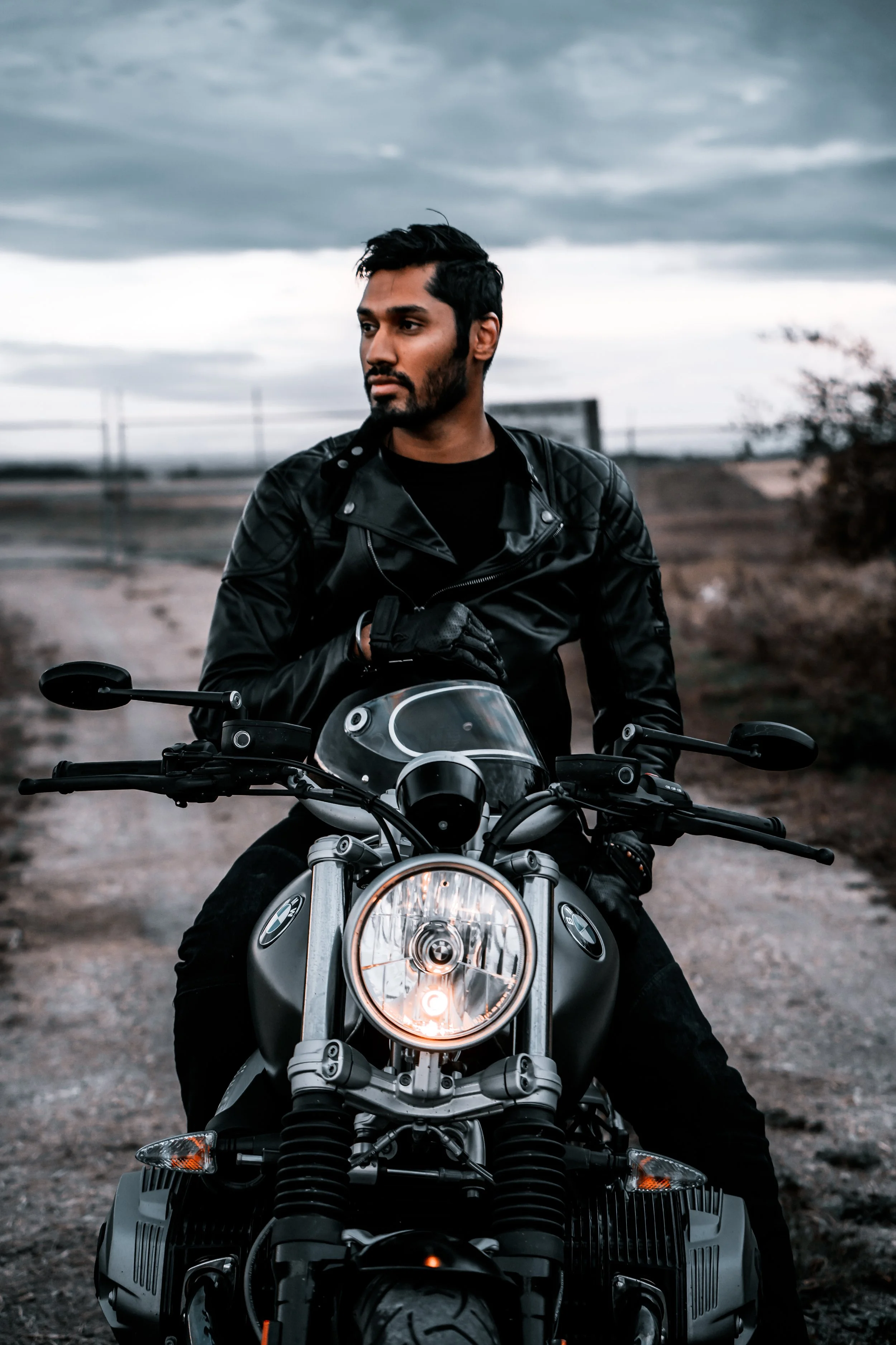 Man sitting on motorcycle | Edmonton motorcycle photographer DarkShark Media