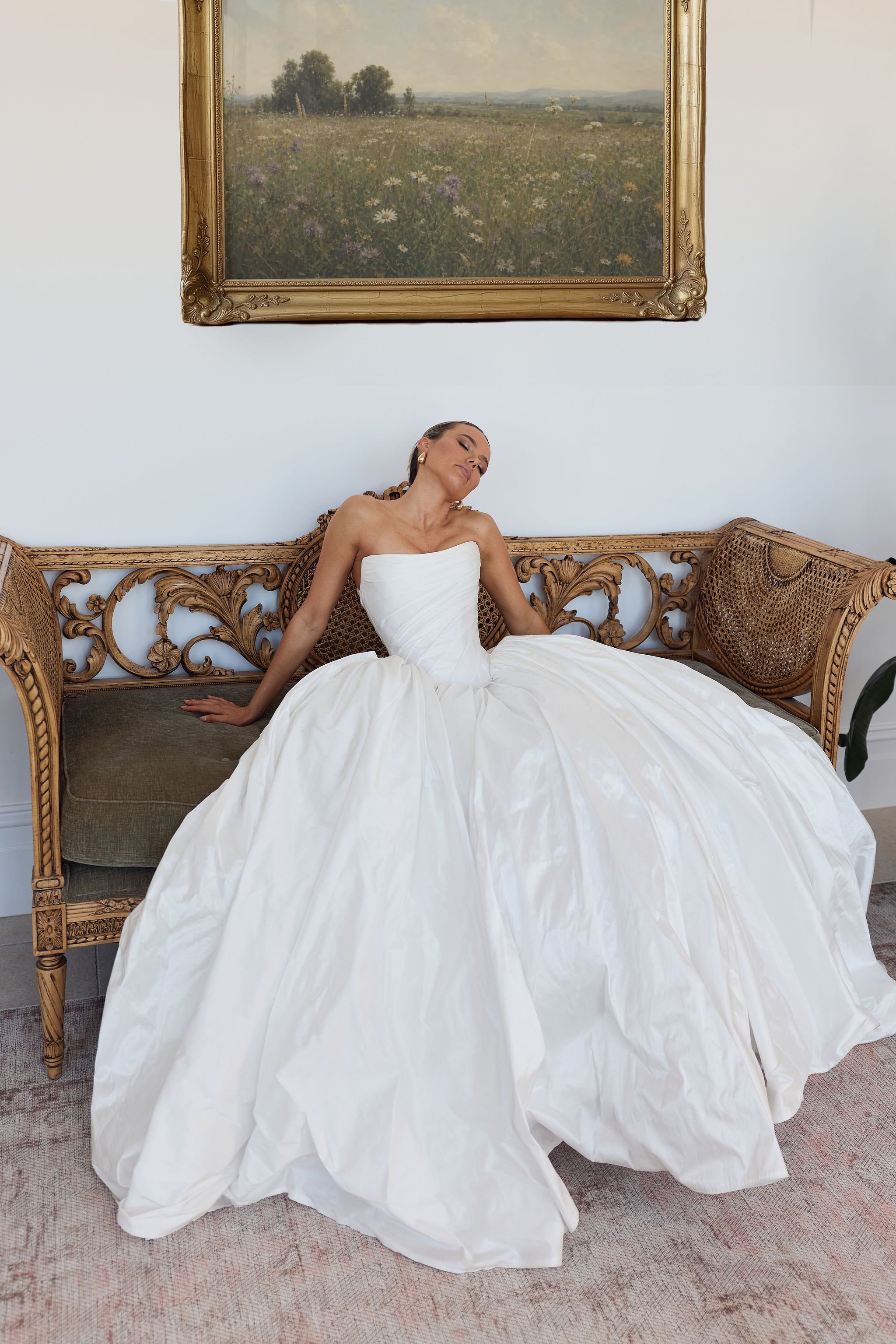 Editorial bridal portrait in strapless wedding gown and natural light