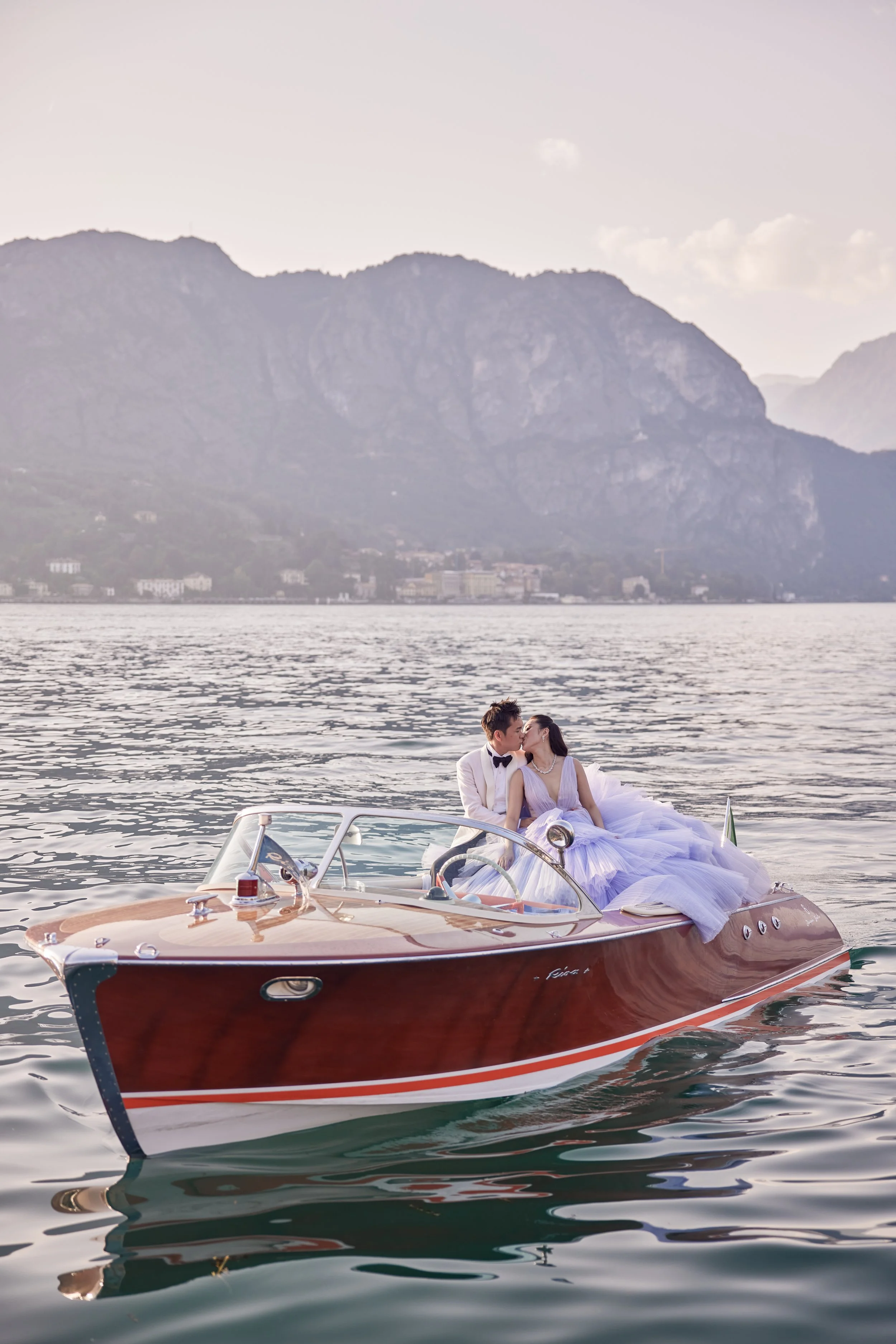 Sunset couple portrait during a Lake Como engagement photoshoot on the water.