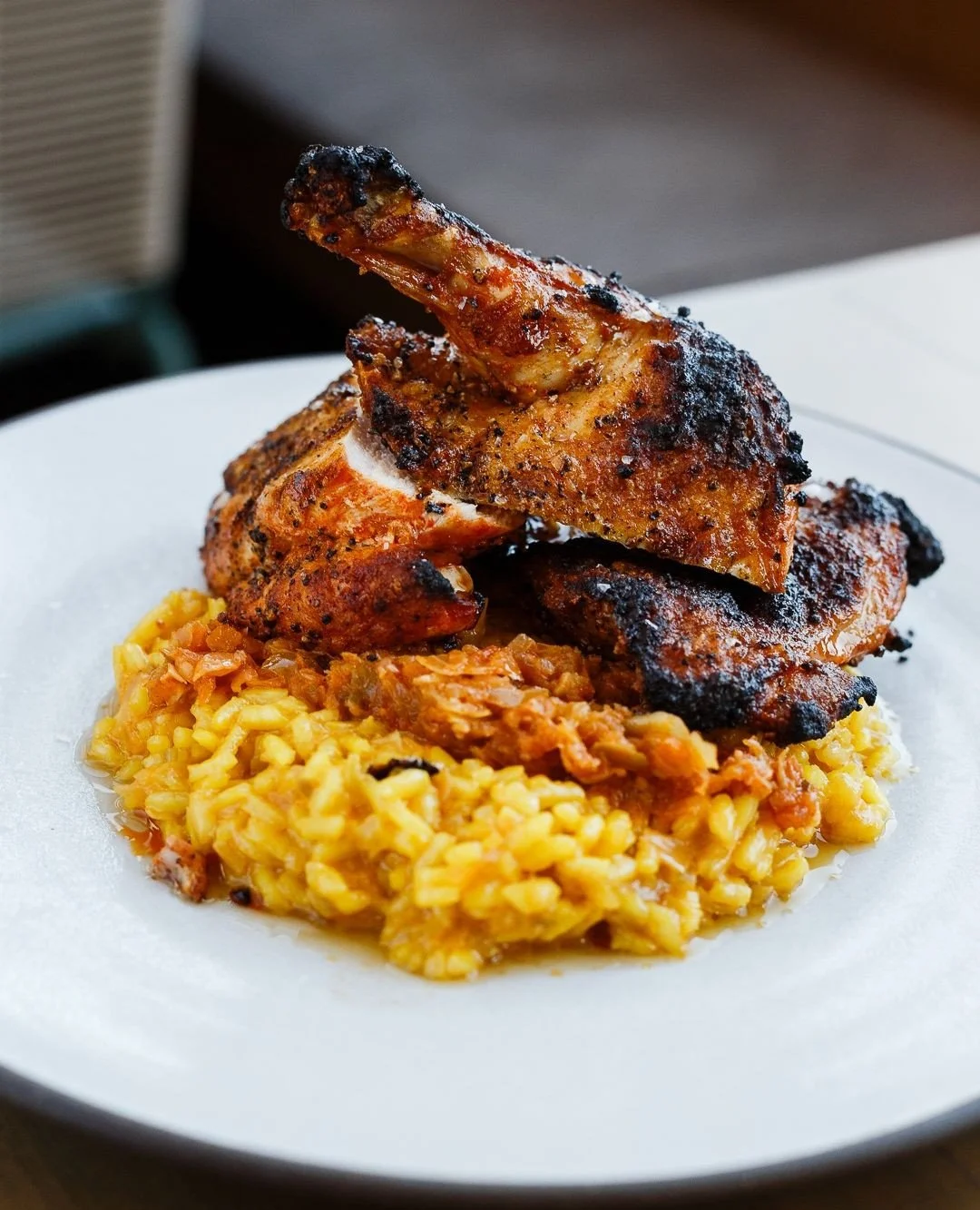 Have you tried our Mary’s Adobo Chicken? 🔥
It’s marinated overnight in adobo, grilled on the @josperofficial for a perfect char, and served over creamy saffron risotto.

