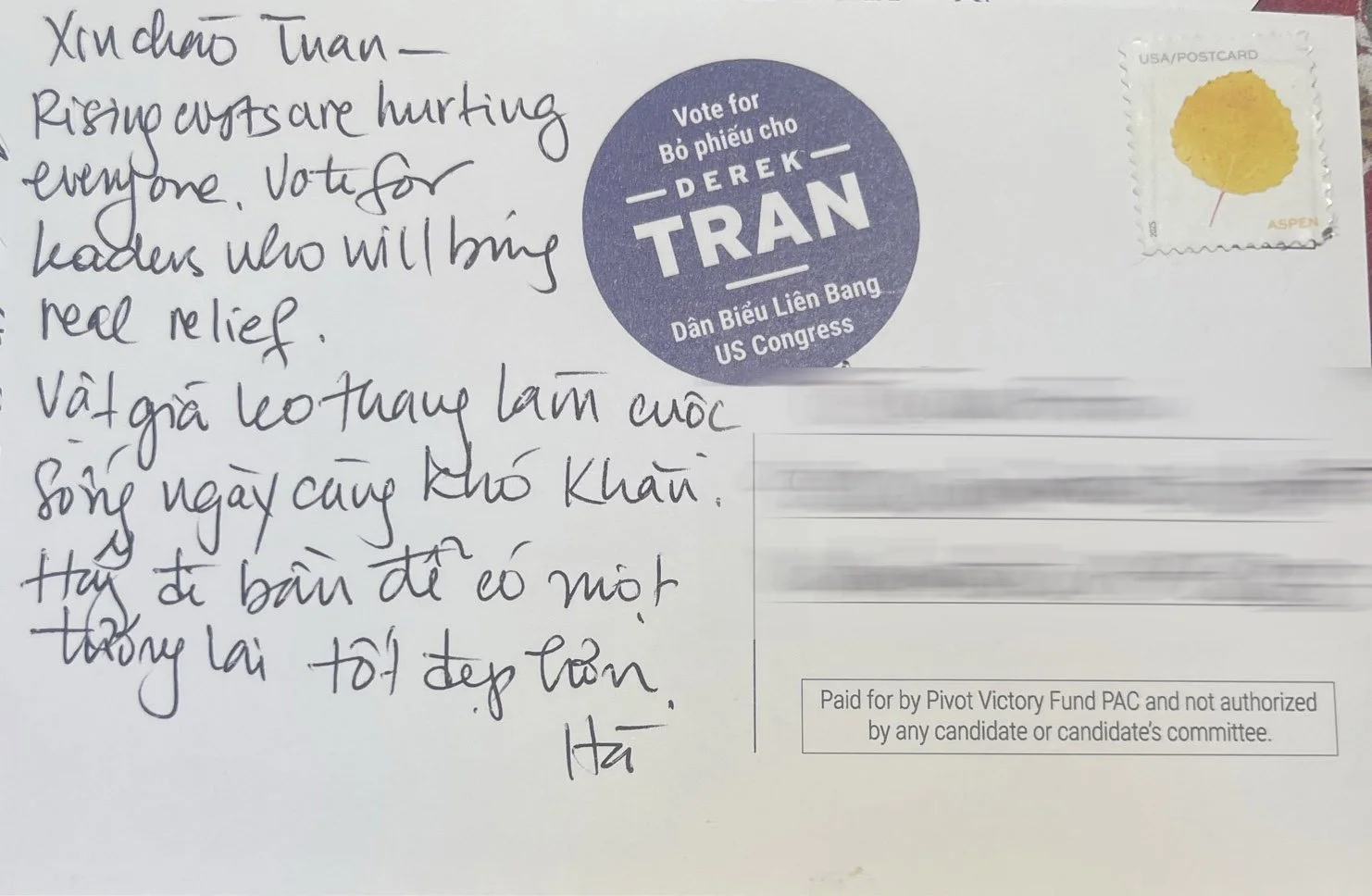 Back of the 2026 PVF postcard: handwritten message in English and Vietnamese urging a vote for Derek Tran