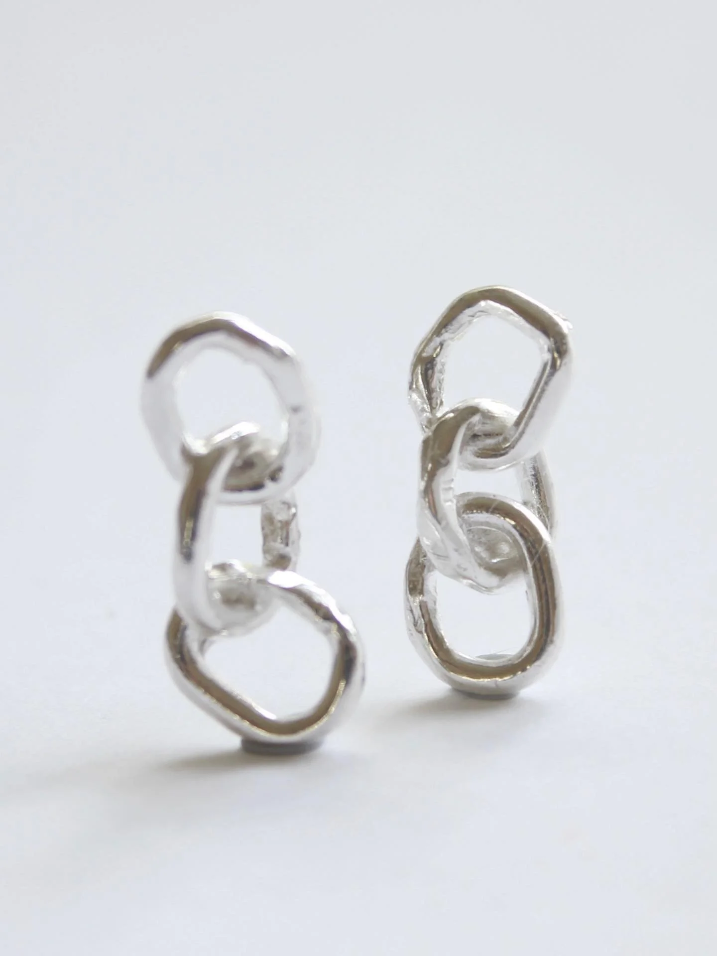 The skinny link studs.  Three chain links, hanging delicately down.

Classic. One of a kind. Handmade.
.
.
.