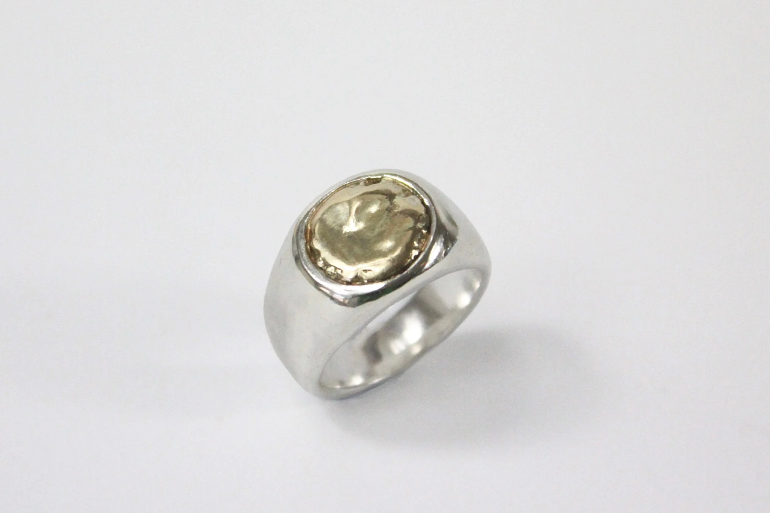 Molten gold embedded in a silver band. 
A one of a kind ring.
.
.
.
#handmade