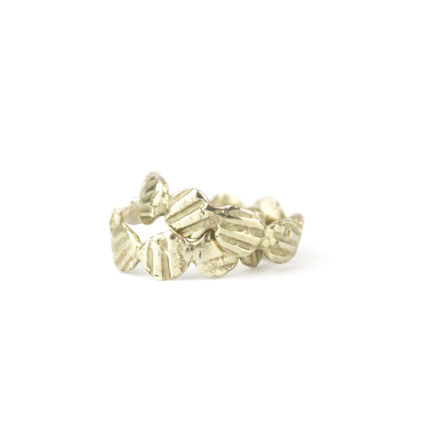 gold ring with design imprinted from seashells
