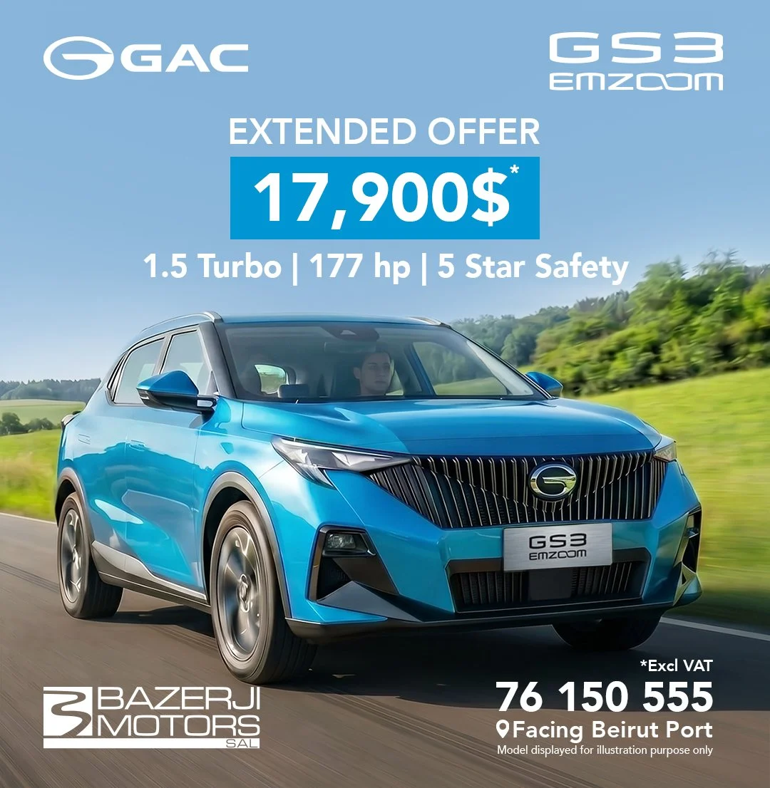 Blue GAC GS3 Emzoom SUV driving on a road with a green landscape, promotional text advertising an extended offer of $17,900, 1.5 Turbo engine, 177 horsepower, 5-star safety, and contact phone number, with dealership name 'Bazerji Motors' and location 'Facing Beirut Port'.