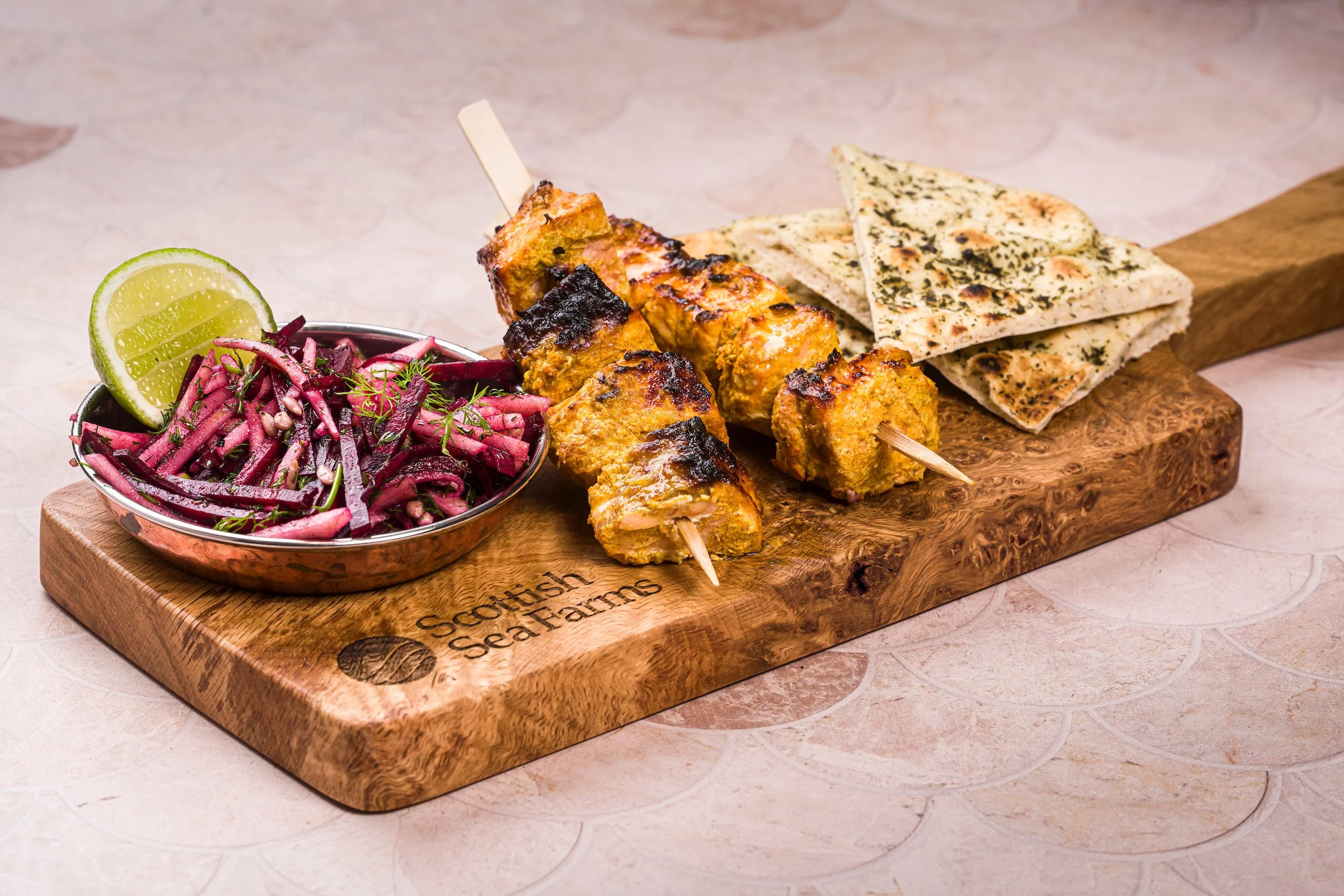 salmon tikka kebabs with slaw and flatbreads